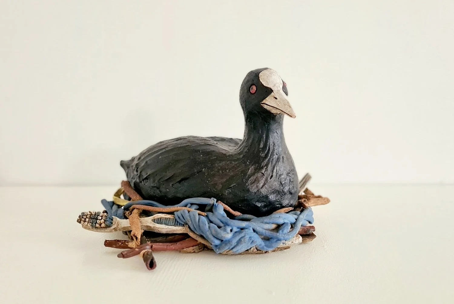 "Nester", 2025. Glazed ceramics. 15 x 22 x 23 cm