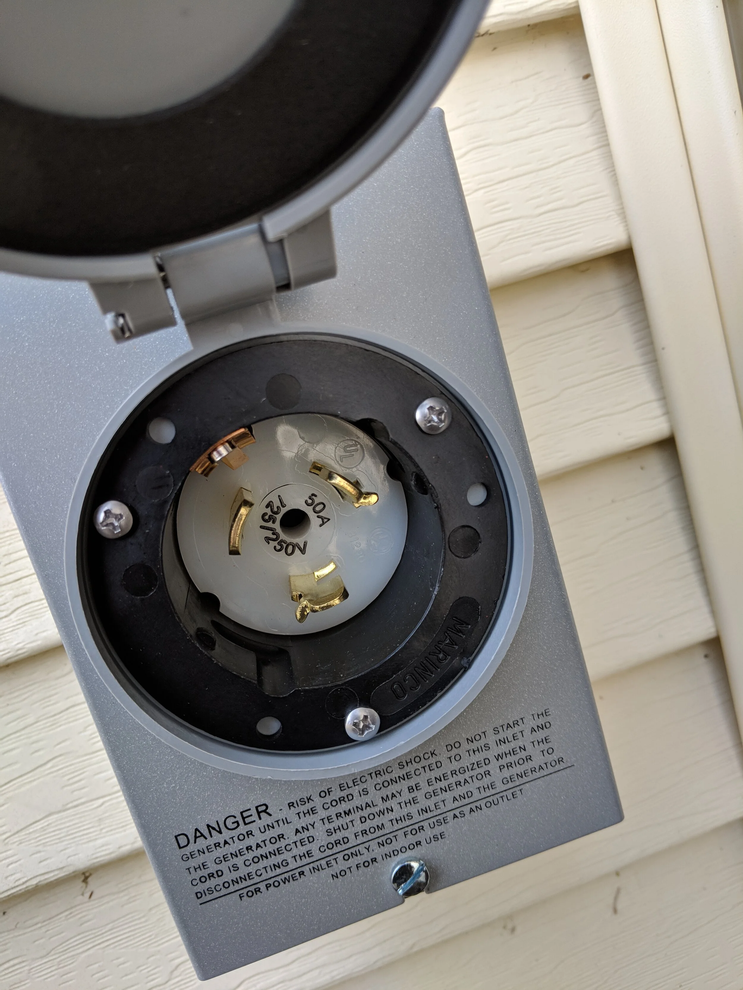 Generator back-feed receptacle, interlocked for safe operation
