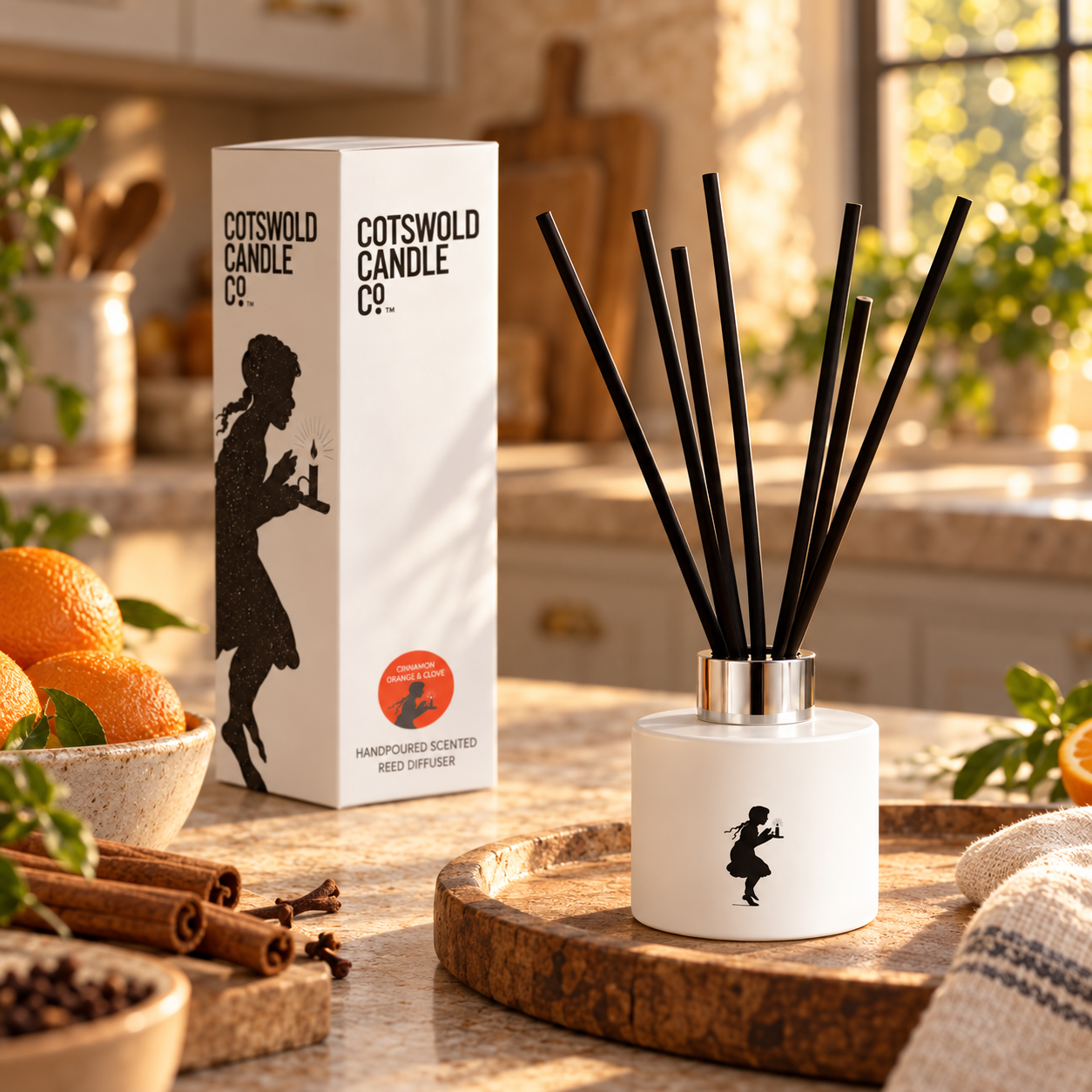 Cinnamon Orange & Clove reed diffuser styled in a room