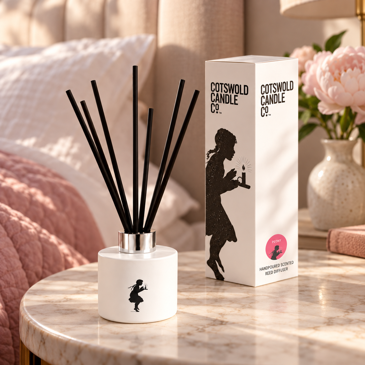 Peony reed diffuser styled in a room