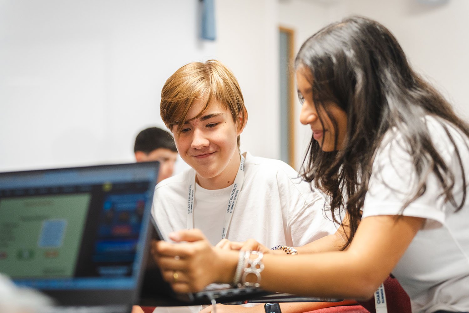 Students working together in Global Leadership class