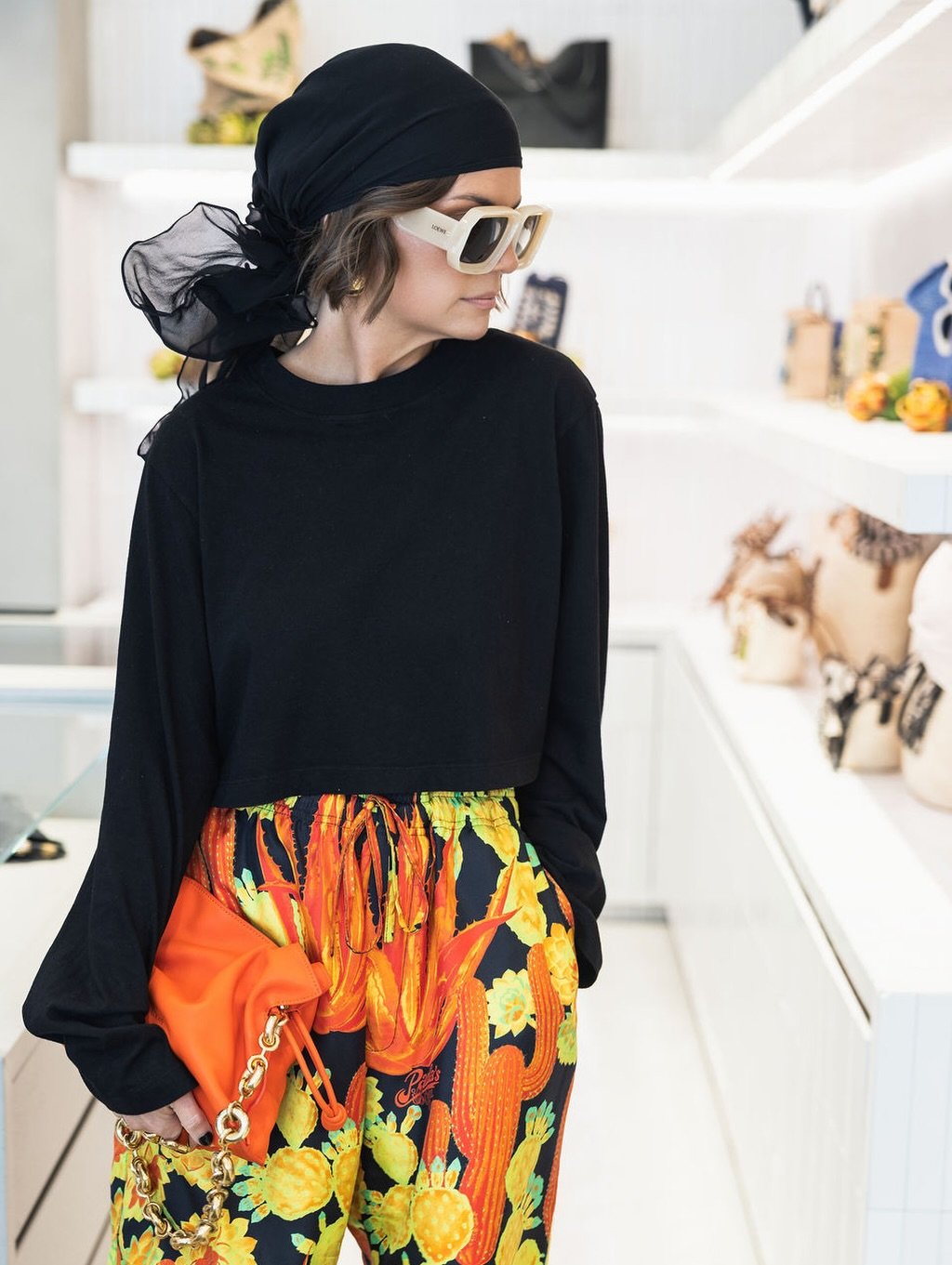@loewe x LF 🖤

HUGE thank you to my @loewe family (cc: @__michaelmartinez__) for inviting me and my clients to experience the paula&rsquo;s ibiza drop with you. many more to come 🖤

shorts, sunglasses, bag: @loewe 
head scarf: @magdabutrym 
shoes: 
