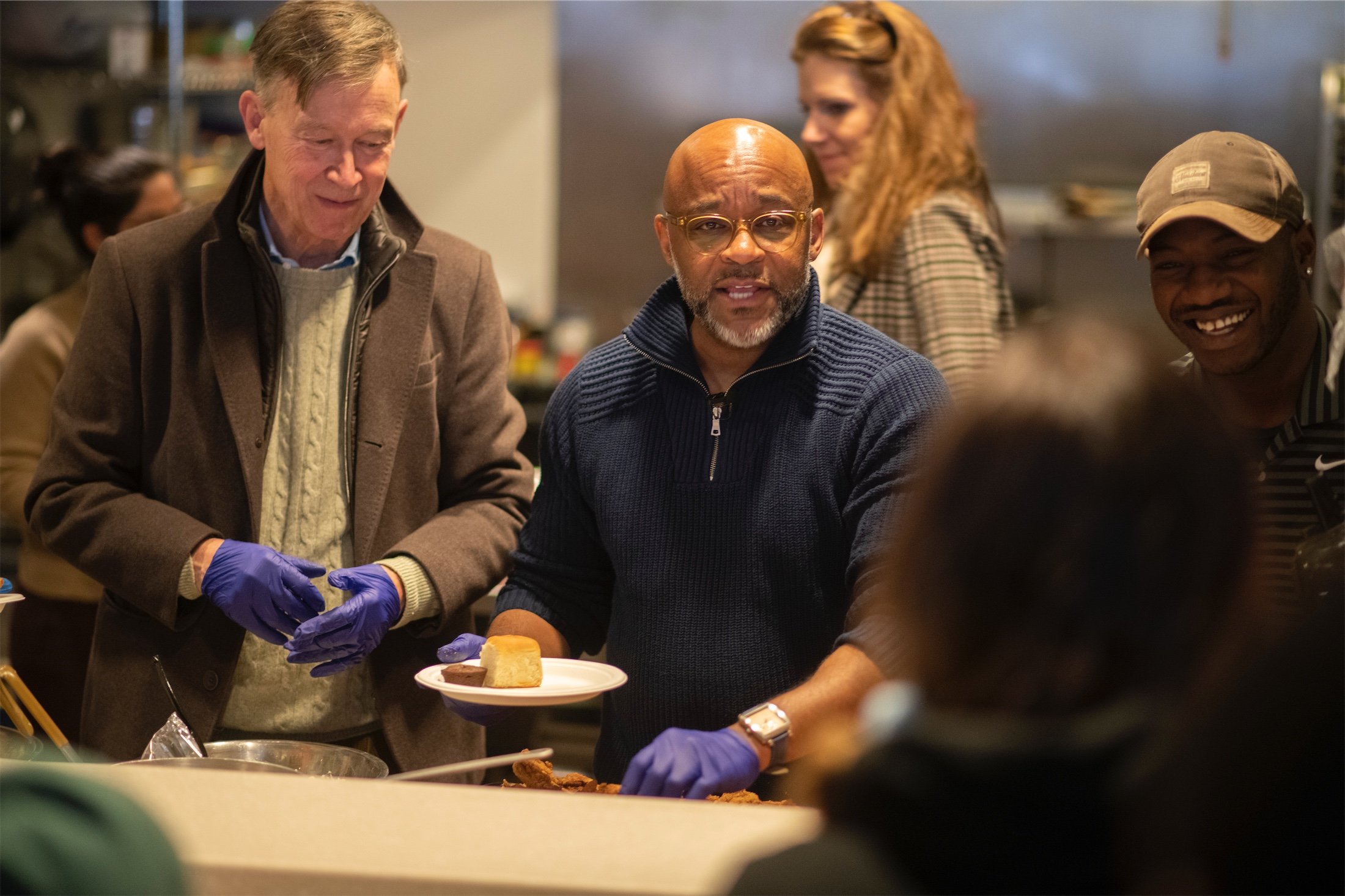 Sen. John Hickenlooper, Mayor Michael Hancock serve lunch to youth experiencing homelessness at Urban Peak