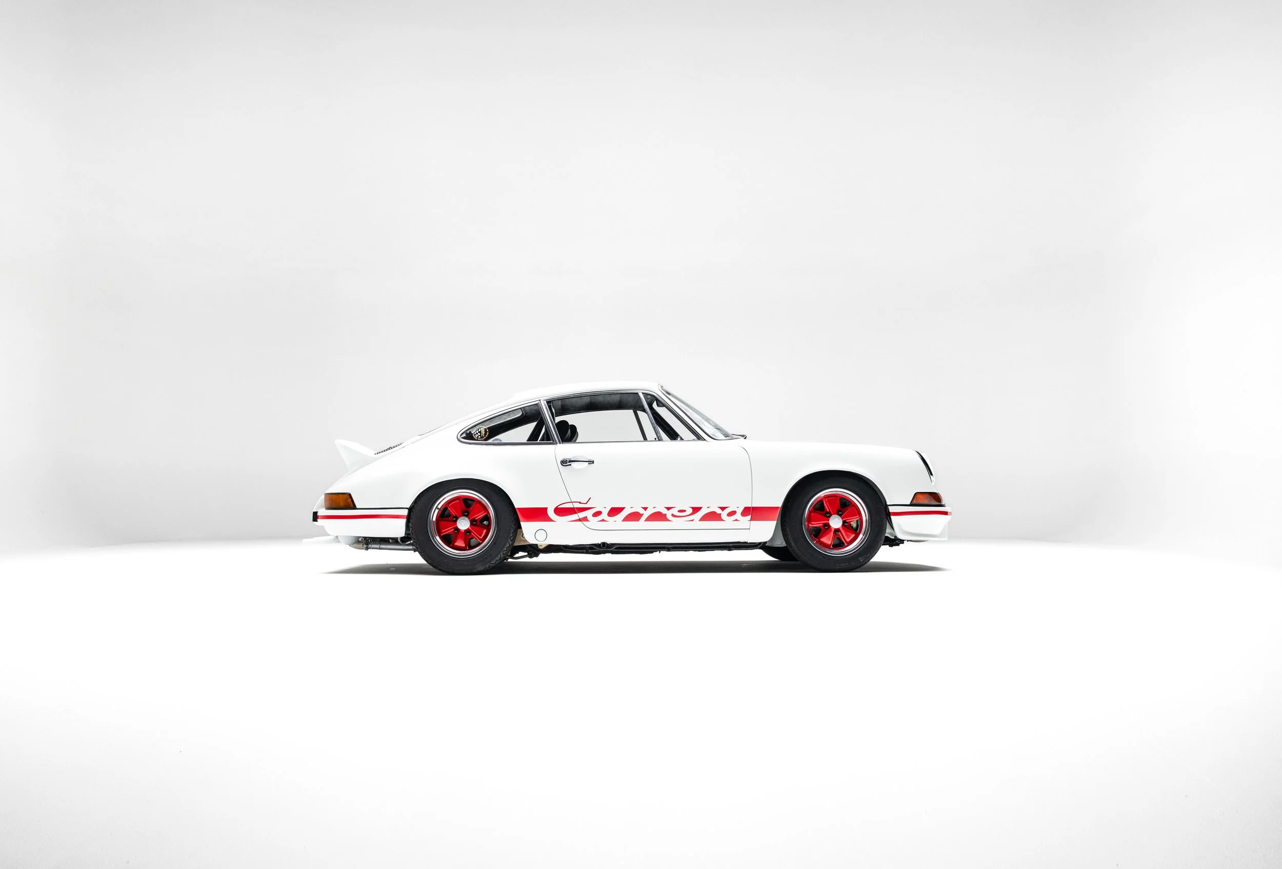 1973 Porsche 911 Carrera RS Touring Now Live on BaT