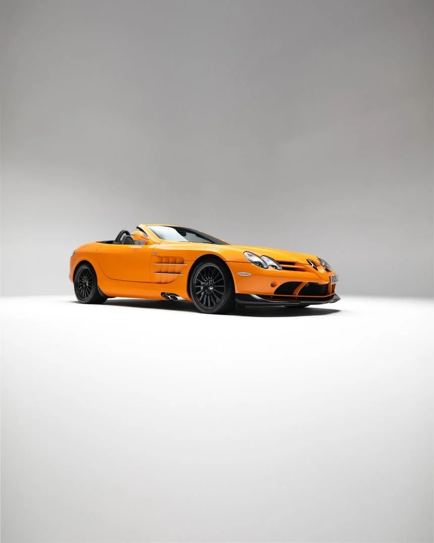 2009 Mercedes-Benz SLR McLaren 722 S Roadster Stealth in Papaya Orange, front three-quarter view