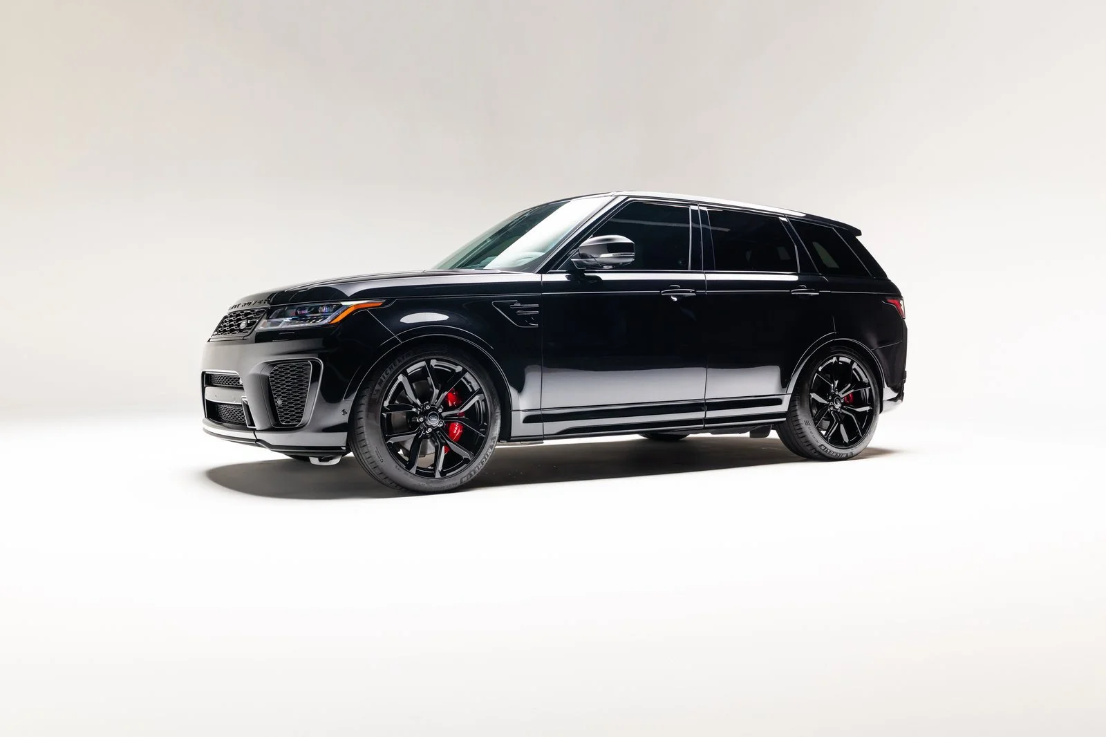 2022 Range Rover Sport SVR — front three-quarter studio view