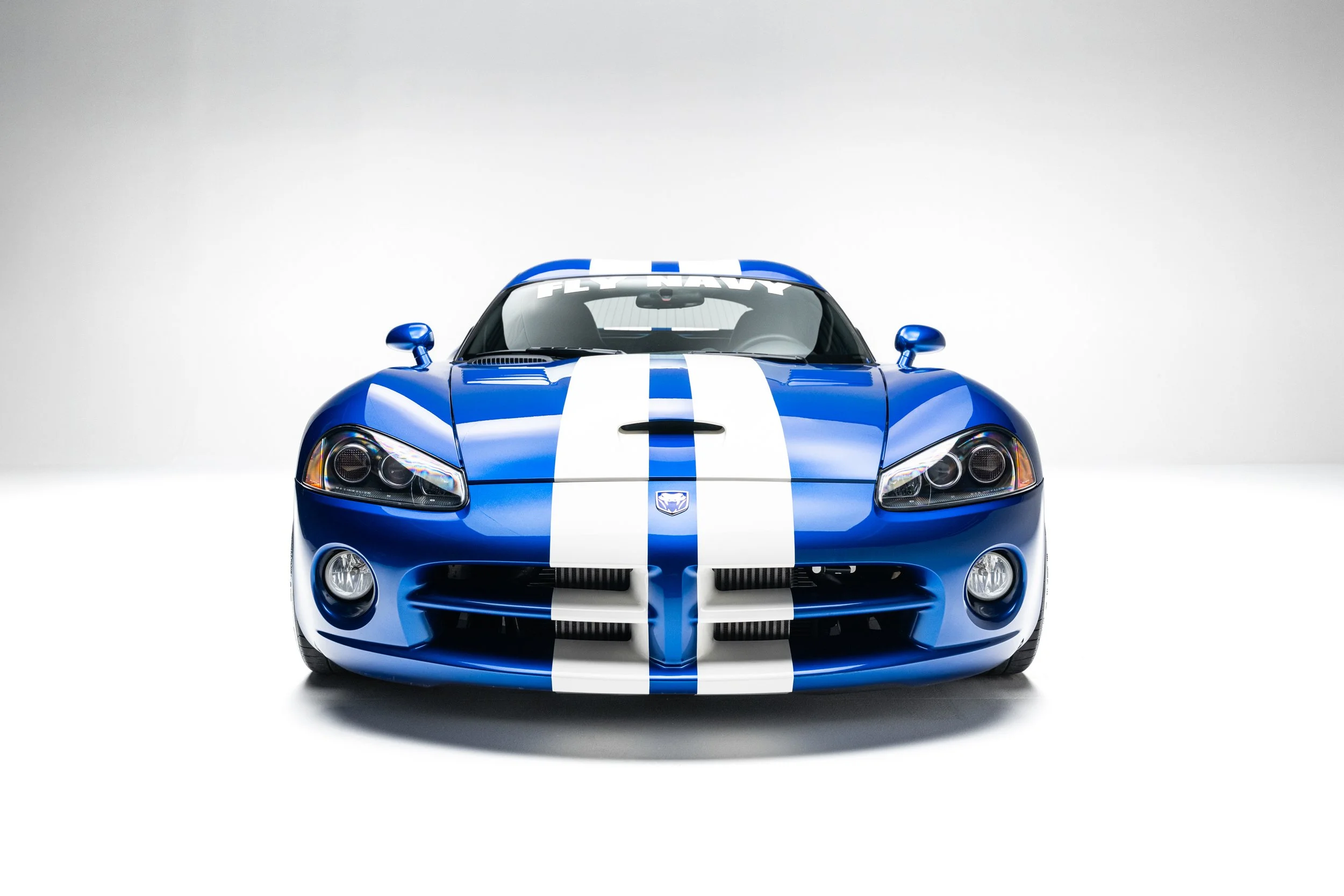 Front view of the blue 2006 Dodge Viper Hennessey Venom 1000 in Fly Navy livery