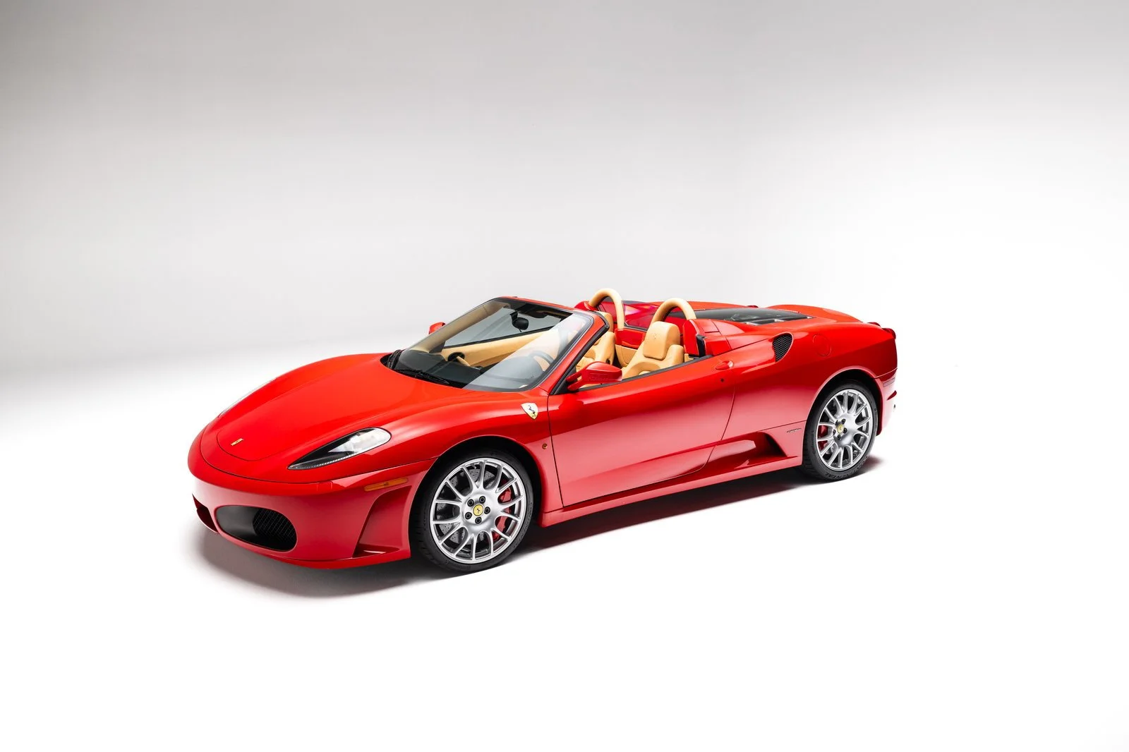 2005 Ferrari F430 Spider in Rosso Corsa, front three-quarter view