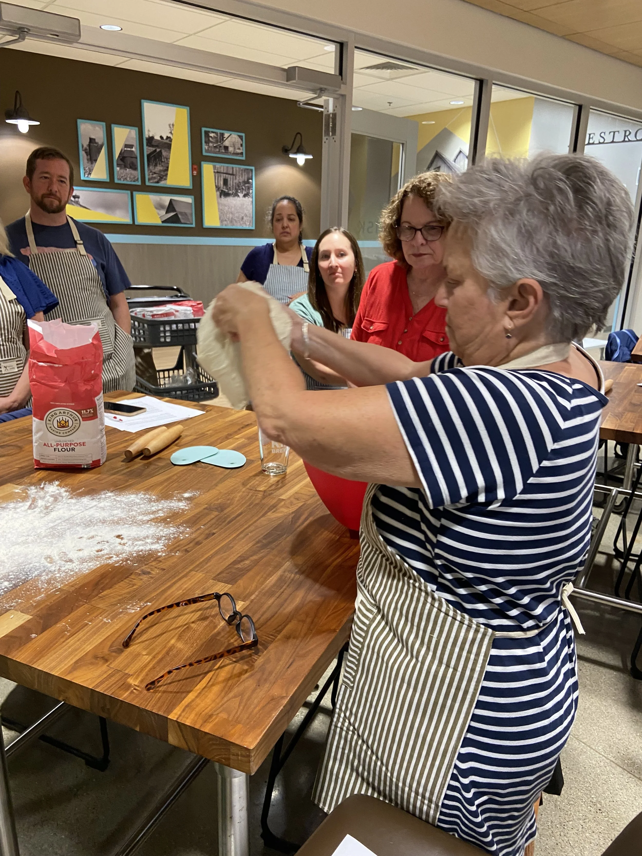 Students learning to make sourdough in the Simply Sourdough class with Nichole Lewis of Divine Heart Bakes