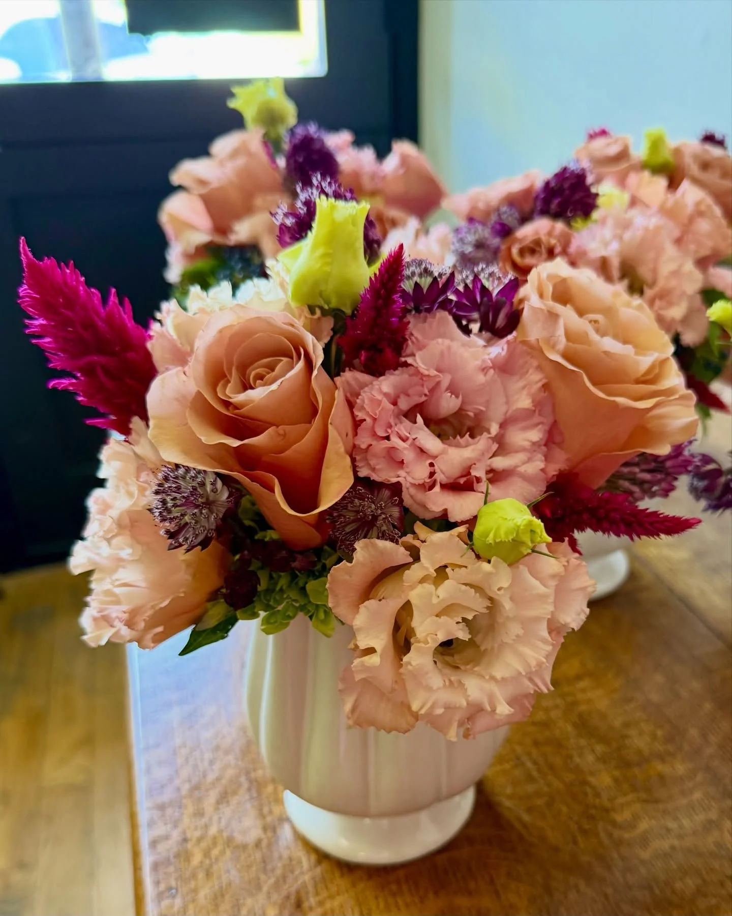 We loved designing these terra cotta, purple, and pink pieces for a bridal shower @longmanandeagle 

The Moab roses and local celosia and lisianthus were the stars of the design. 🤩