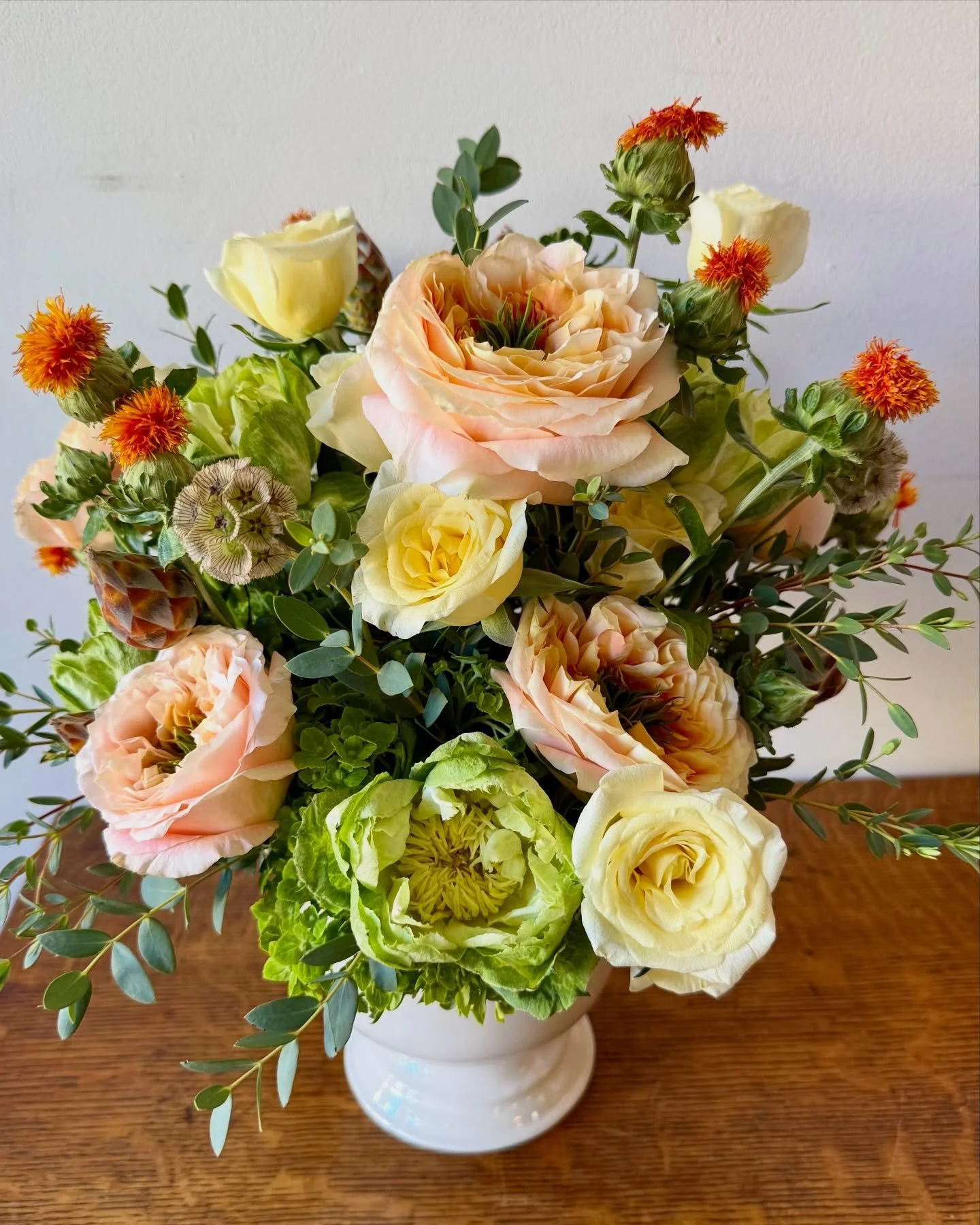 Overgrown fall garden vibes. We are loving the safflower in this colorful bouquet!
