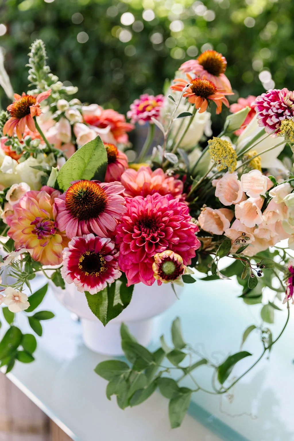 Arrangement of pink cornflowers, dahlias, cornflowers,  fox gloves. Image name: wedding-florist-boise-82