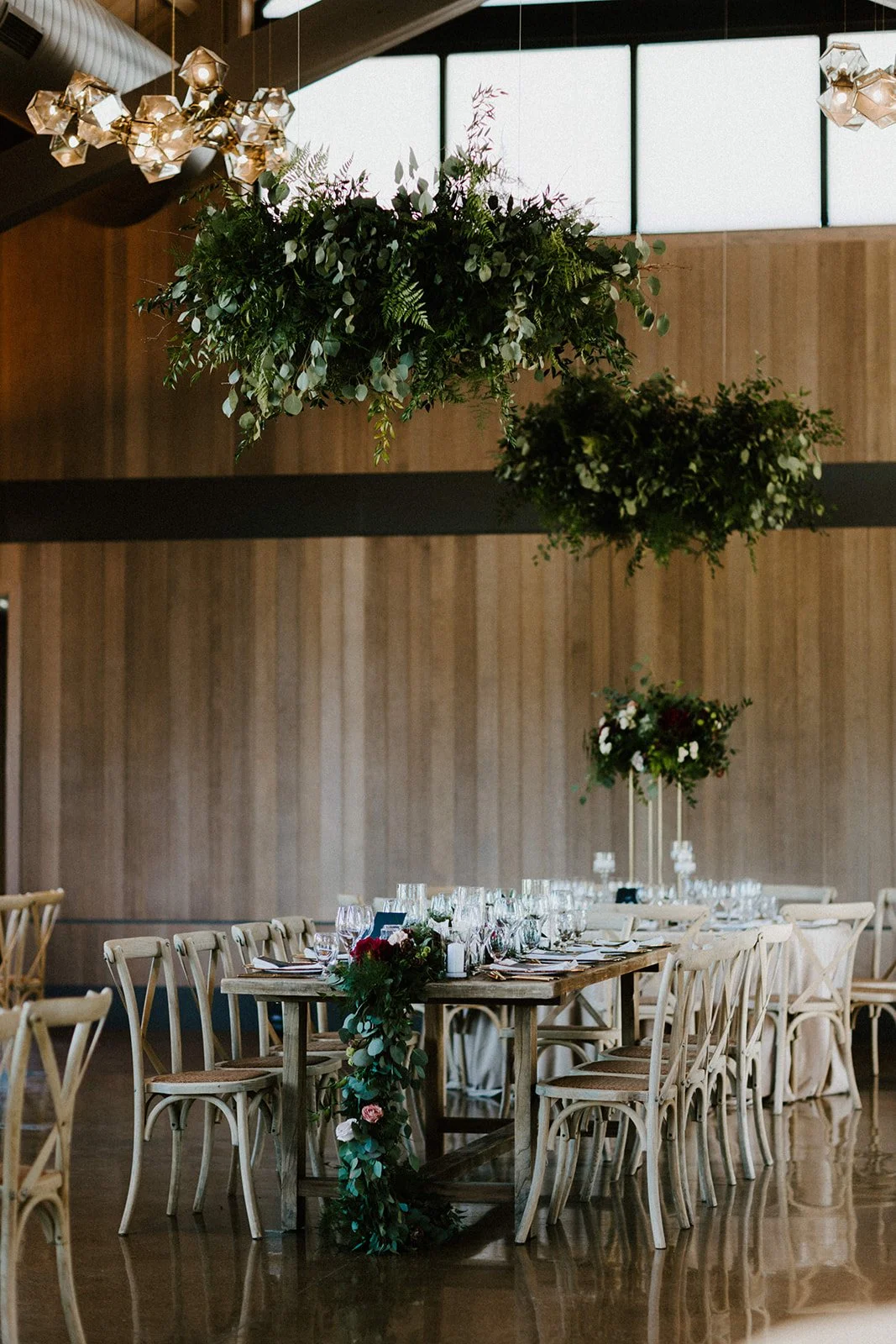 Reception hall with hanging ferns white roses image name: wedding-florist-boise-200