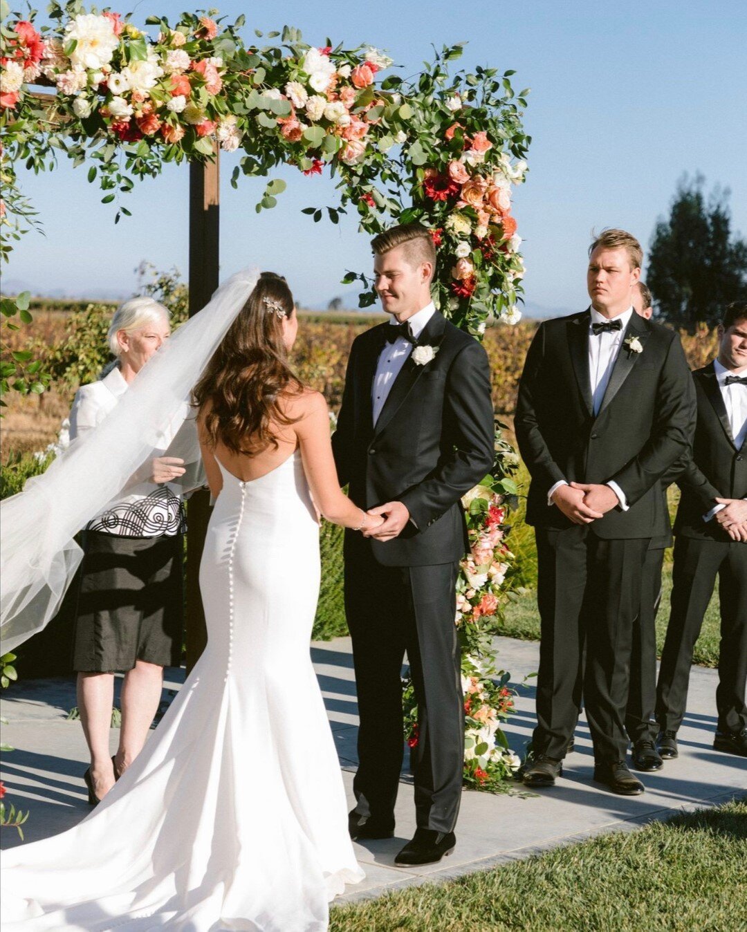 Let me say, it's all about the backdrop!  This couple gave us full creative license to create a lush floral and greenery backdrop with our favorite arbor from @encoreeventsrentals and it's still a huge favorite!

Planning + design: @carlyjsaber_event