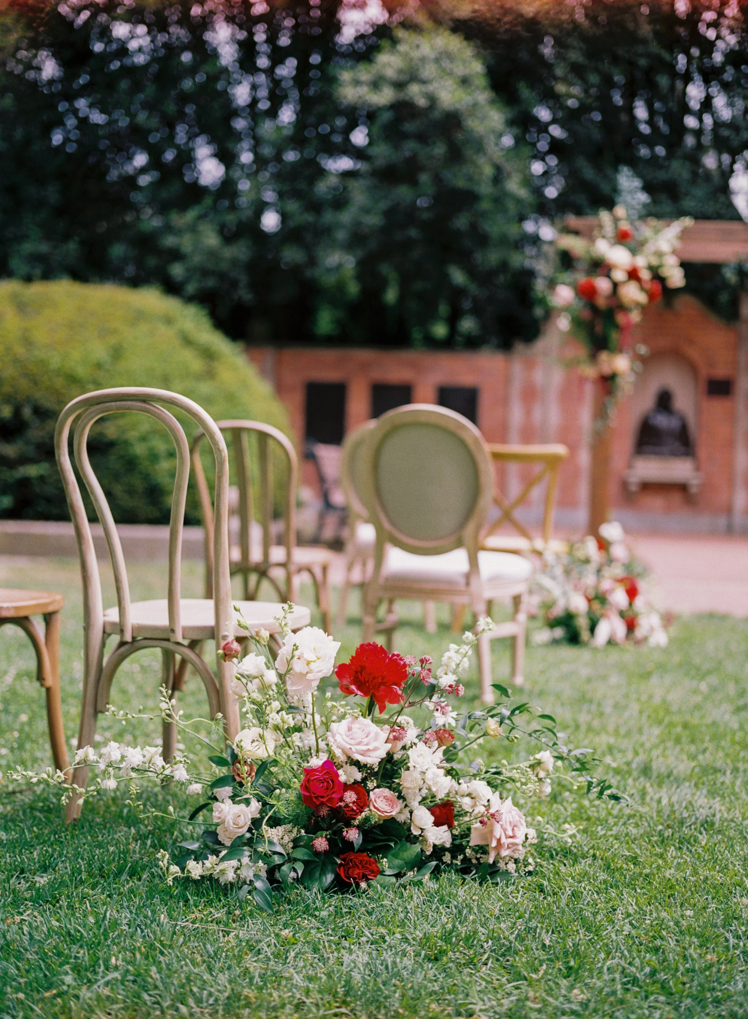 Chairs arranged for outdoor wedding in Boise, ID florals of roses peonies image name: wedding-florist-boise-402