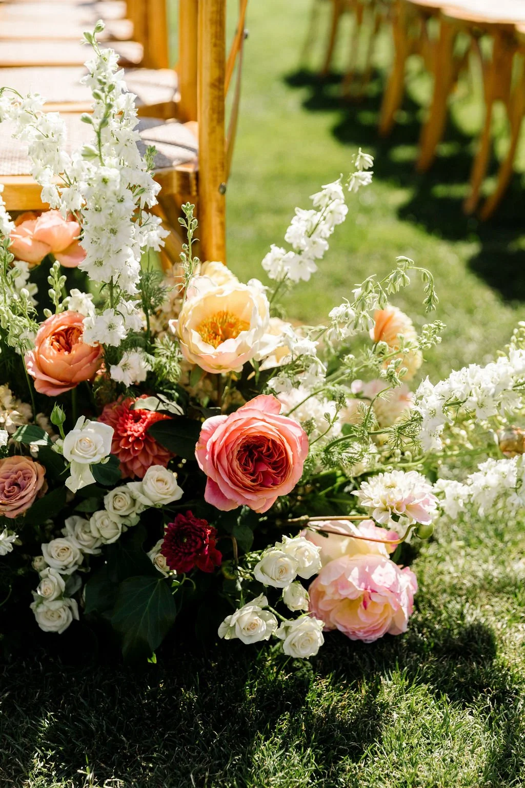 Floral arrangments dahlias, ranunculus, peonies, cornflowers, foxgloves San Francisco farm wedding. Image name: wedding-florist-boise-79