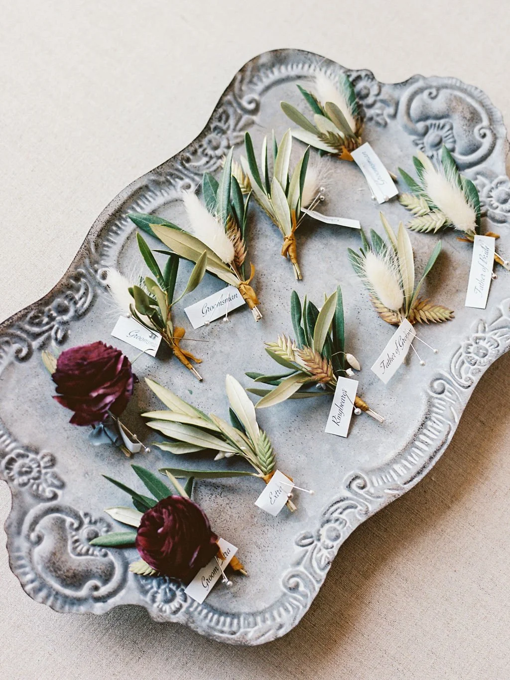 Autumn color boutonnière with butterfly wheat stalks Image name: wedding-florist-boise-174