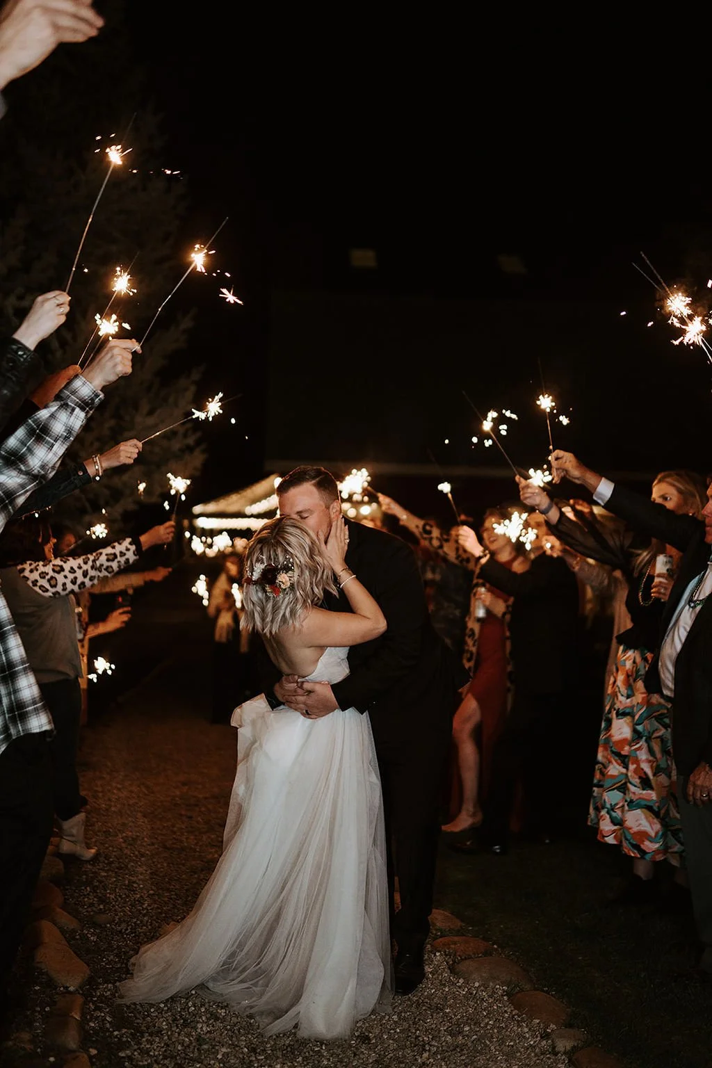 bride and groom sparklers image name: boise-wedding-florist-869