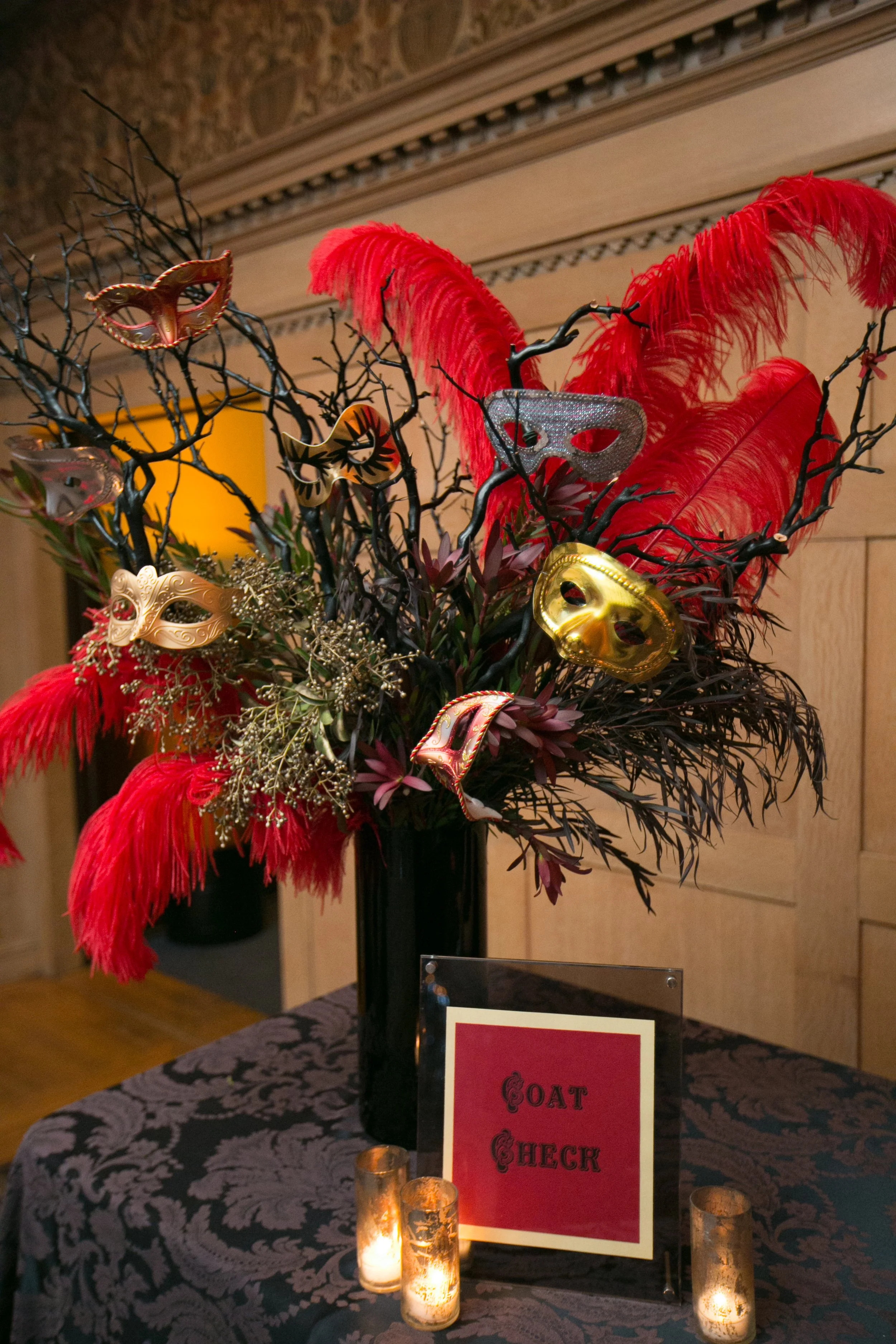 Red feathers gold masquerade mask arrangement masquerade ball San Francisco CA image name: corporate-florist-boise-41