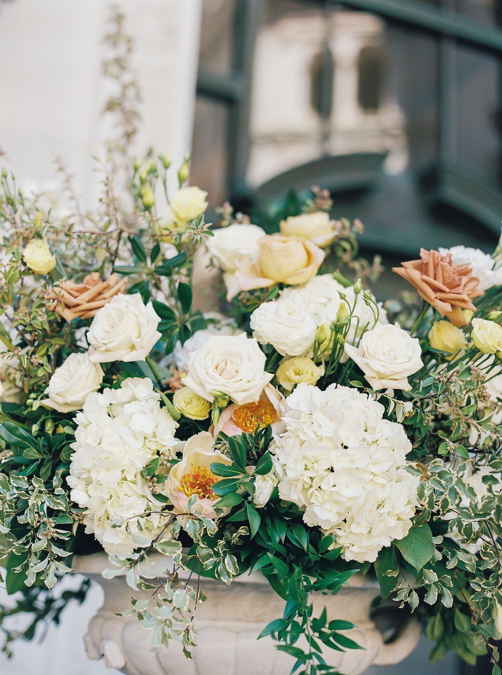 Wedding floral arrangement of white roses, yellow roses, white hydrangeas. Image name: wedding-florist-boise-135