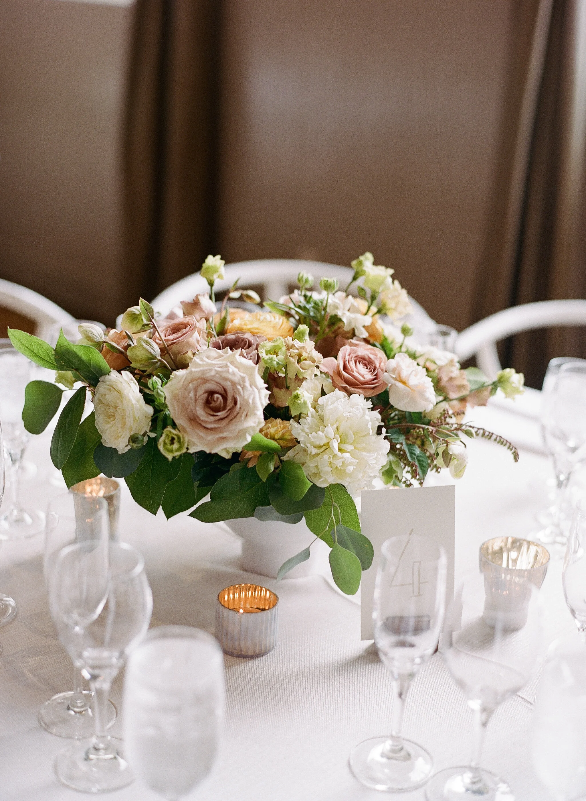 Neutral-tone floral arrangement of white roses white dahlias blush roses image name: wedding-florist-boise-606