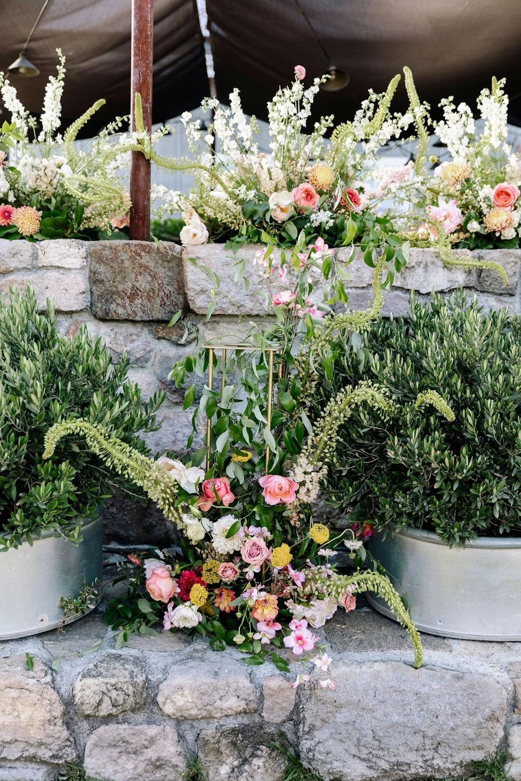 Roses, anemones, ranunculus, peonies, dahlias, cornflowers San Francisco farm wedding. Image name: wedding-florist-boise-96