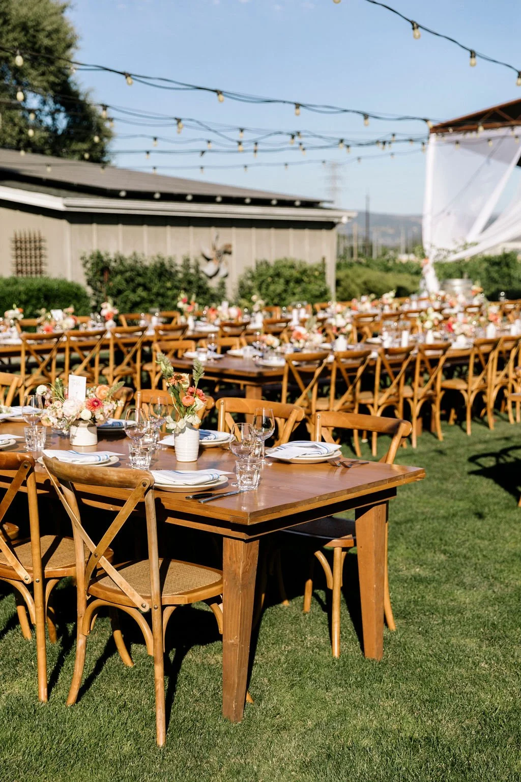 Tables outdoor reception San Francisco farm wedding. Image name: wedding-florist-boise-95