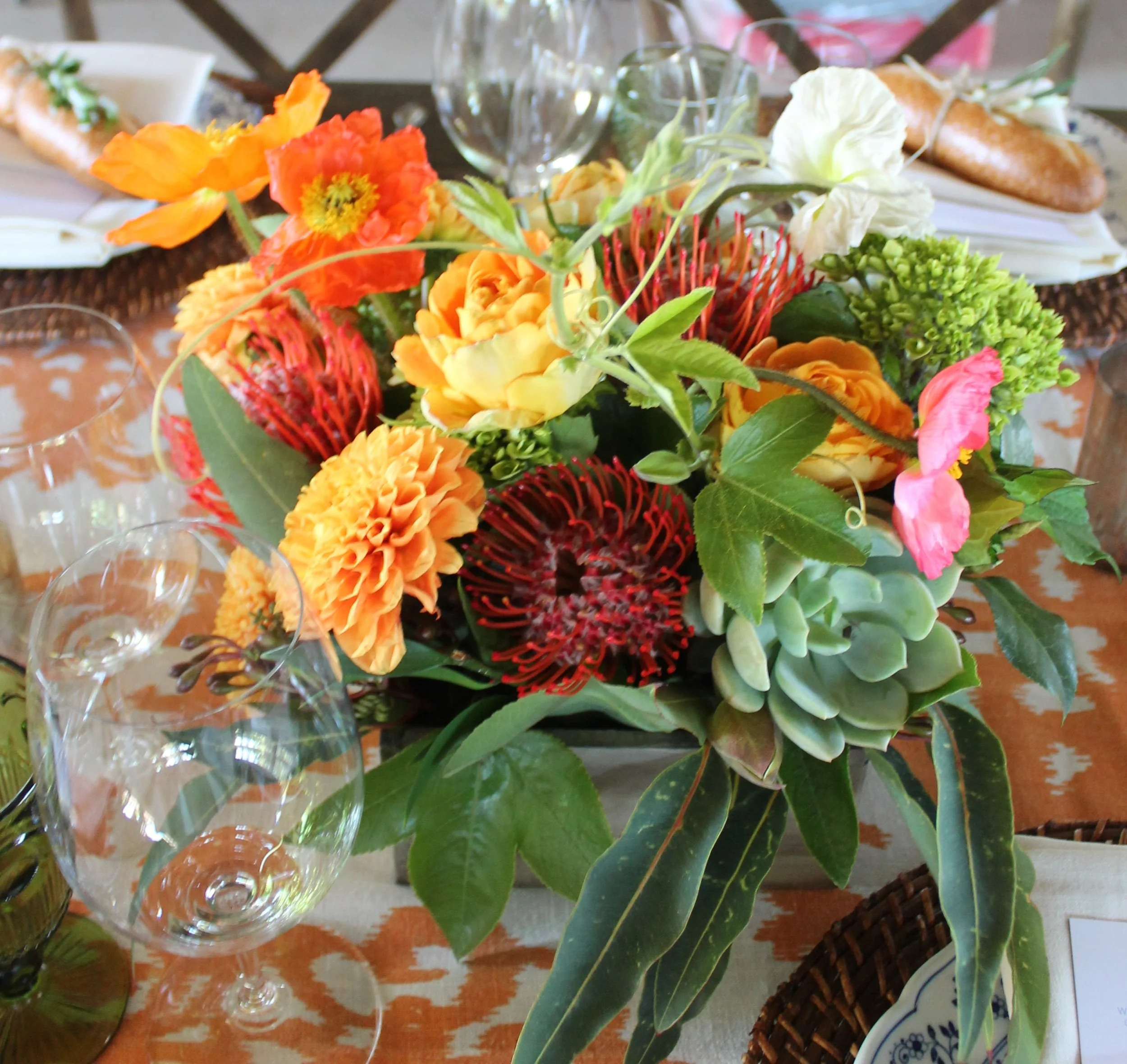 brigh centerpiece orange and apricot succulent farm table sun valley