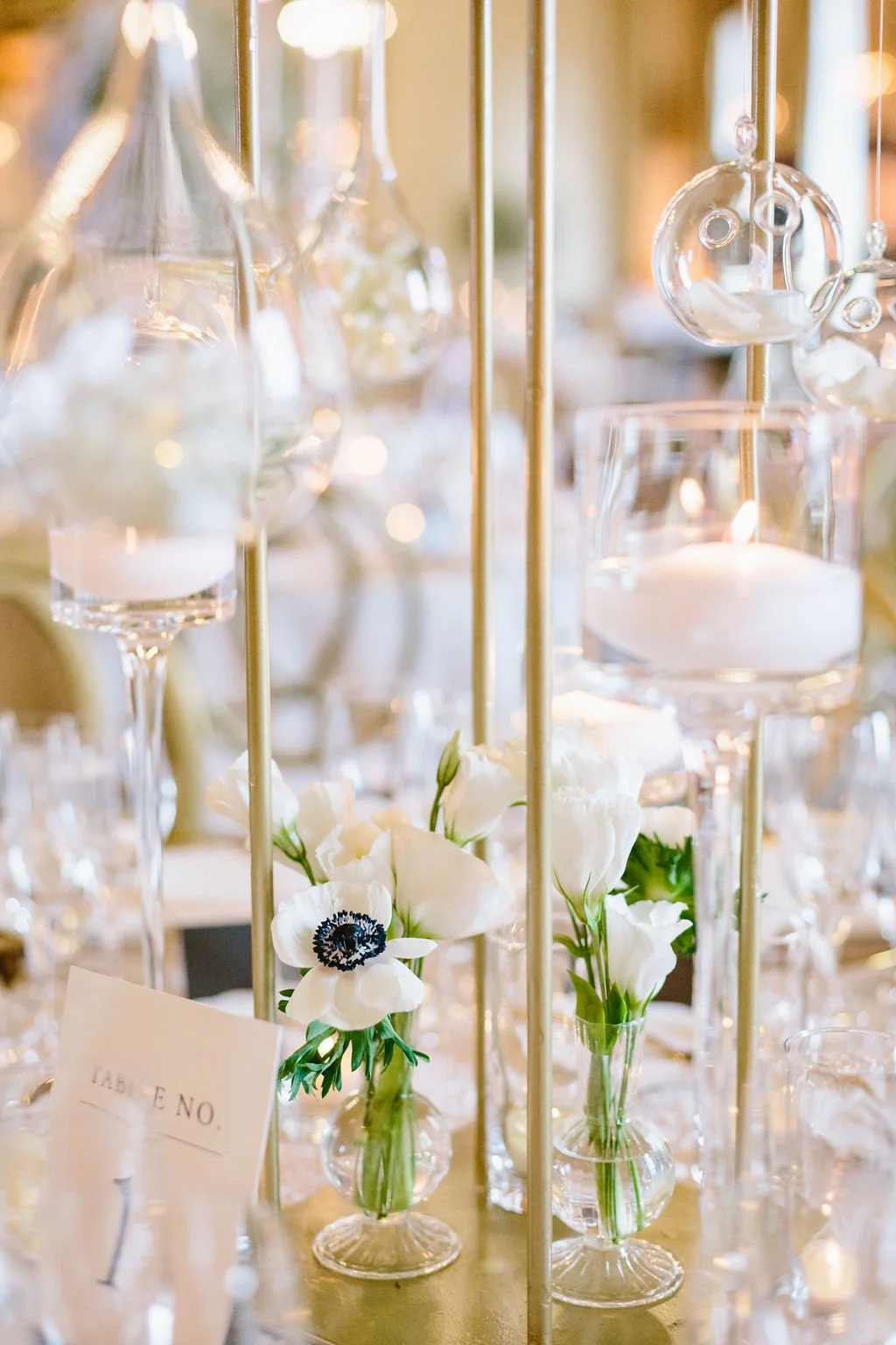 White anemones surrounded by candles at San Francisco wedding reception. Image name: wedding-florist-boise-65