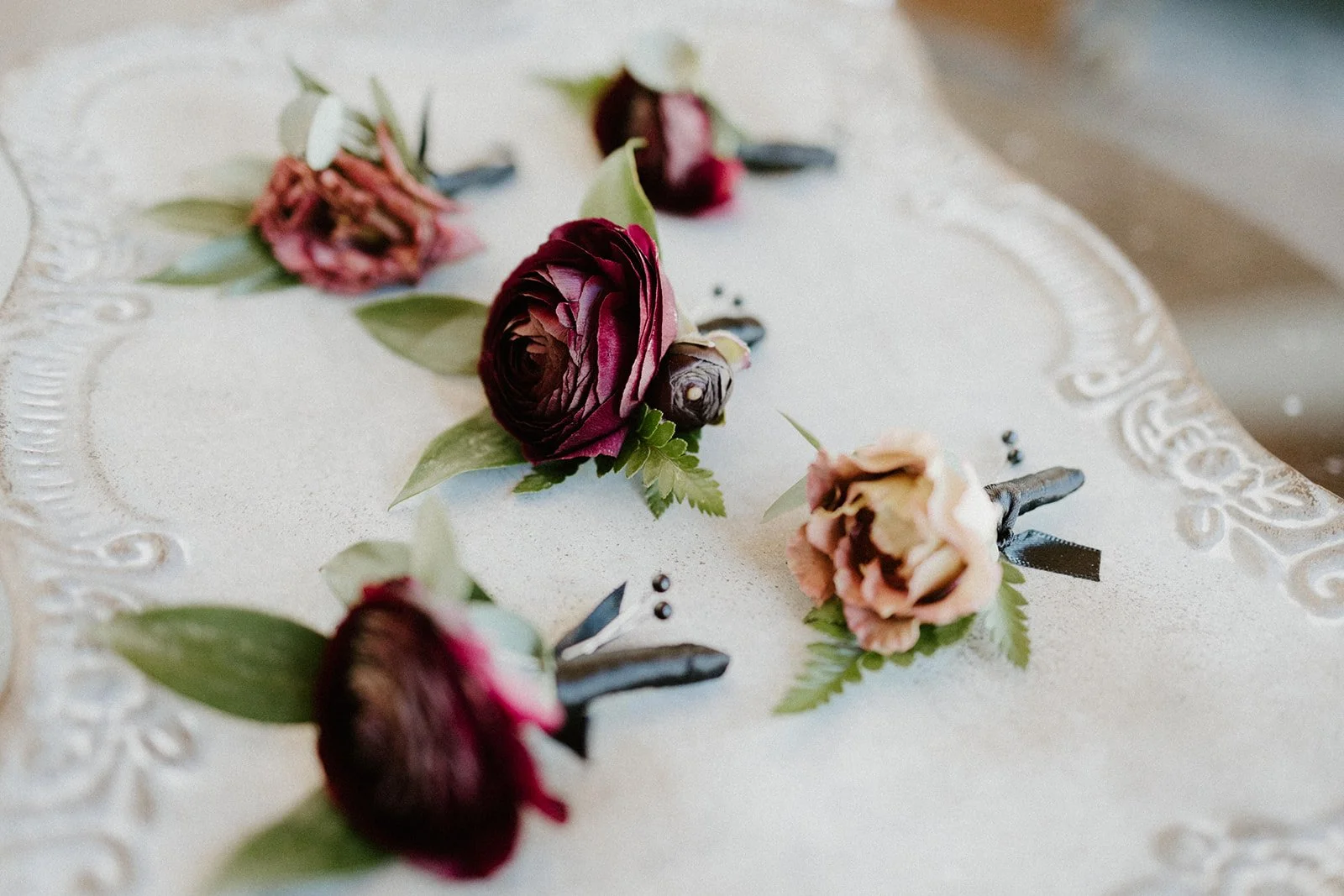 Burgundy roses blush rose boutonniere image name: wedding-florist-boise-189