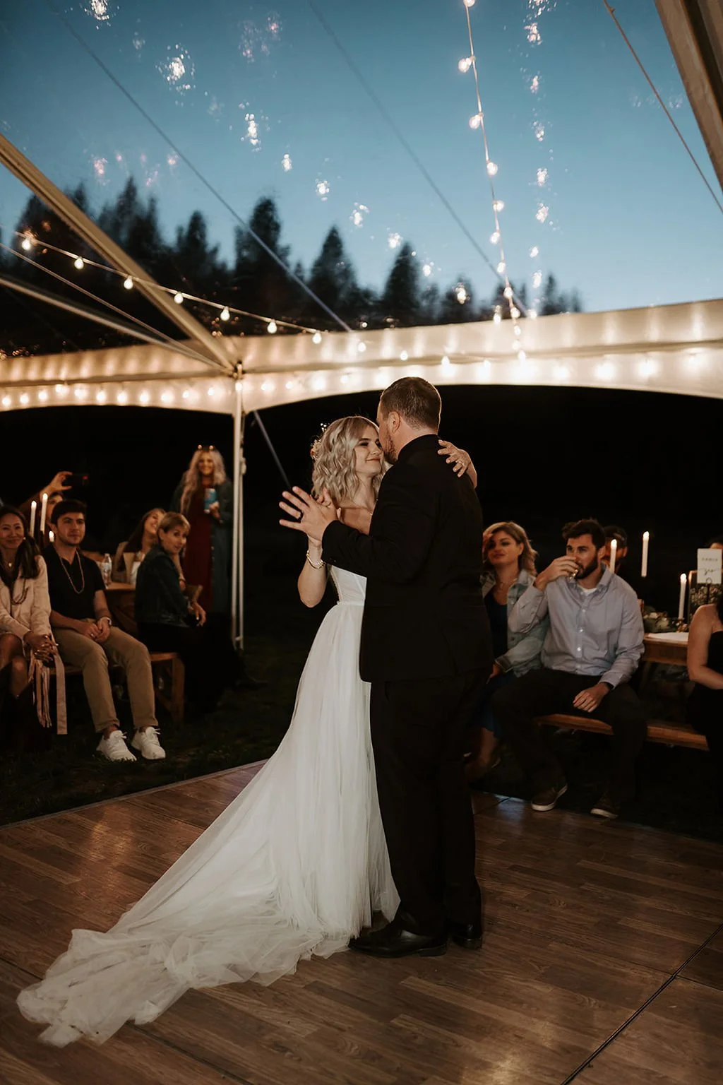 bride and groom in sixty chapel tent dancing image name: boise-wedding-florist-866