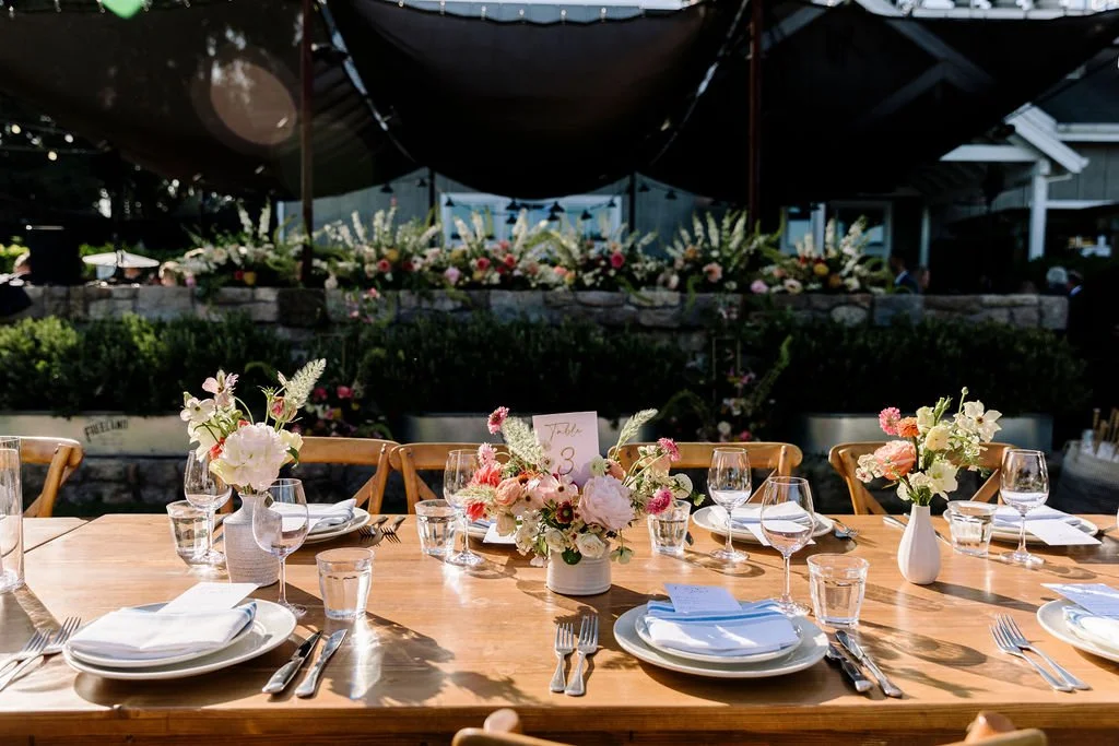 vases filled pink peonies, anemones San Francisco California wedding. Image name: wedding-florist-boise-93