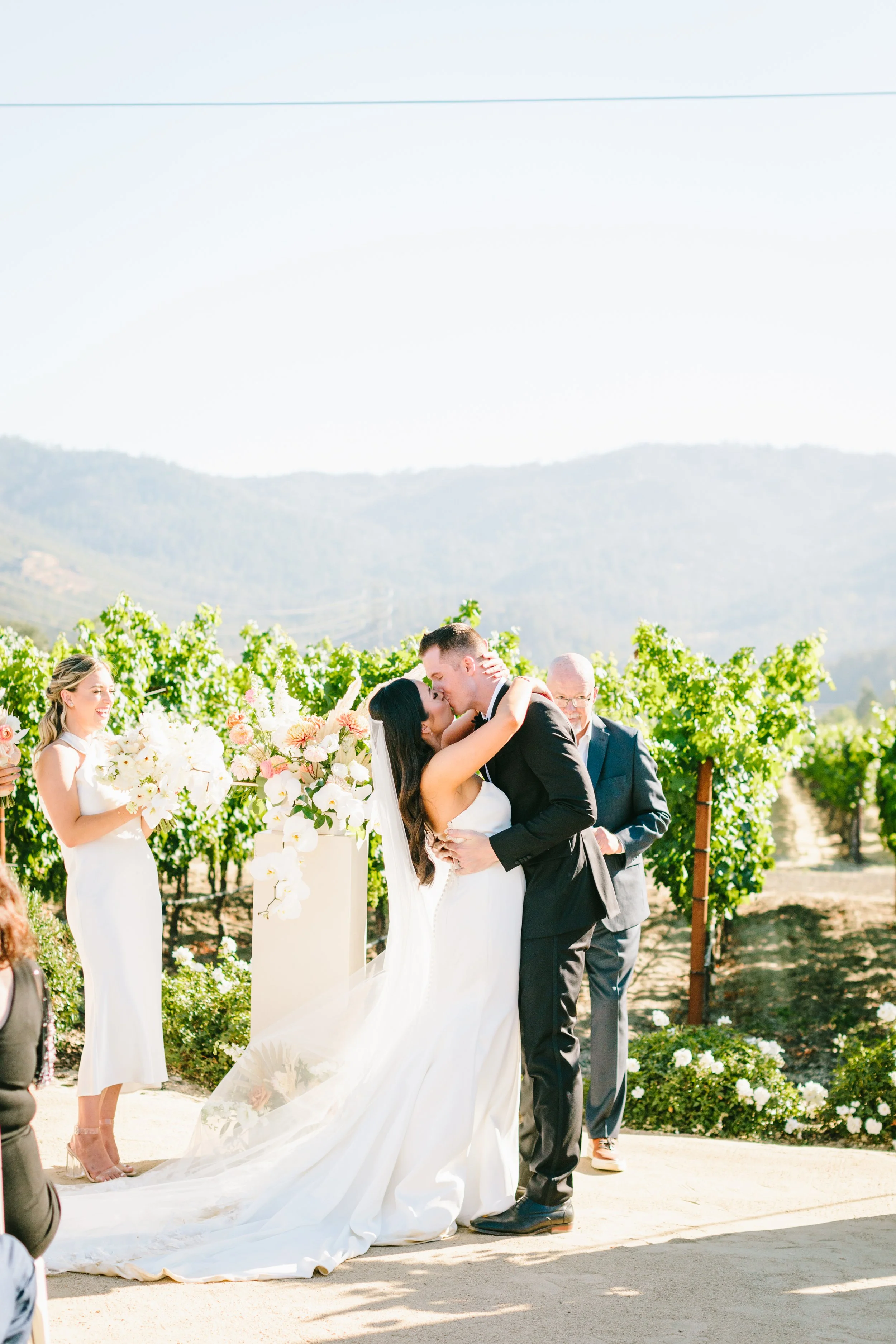 Couple embrace at California vineyard wedding. Image name: wedding-florist-boise-159