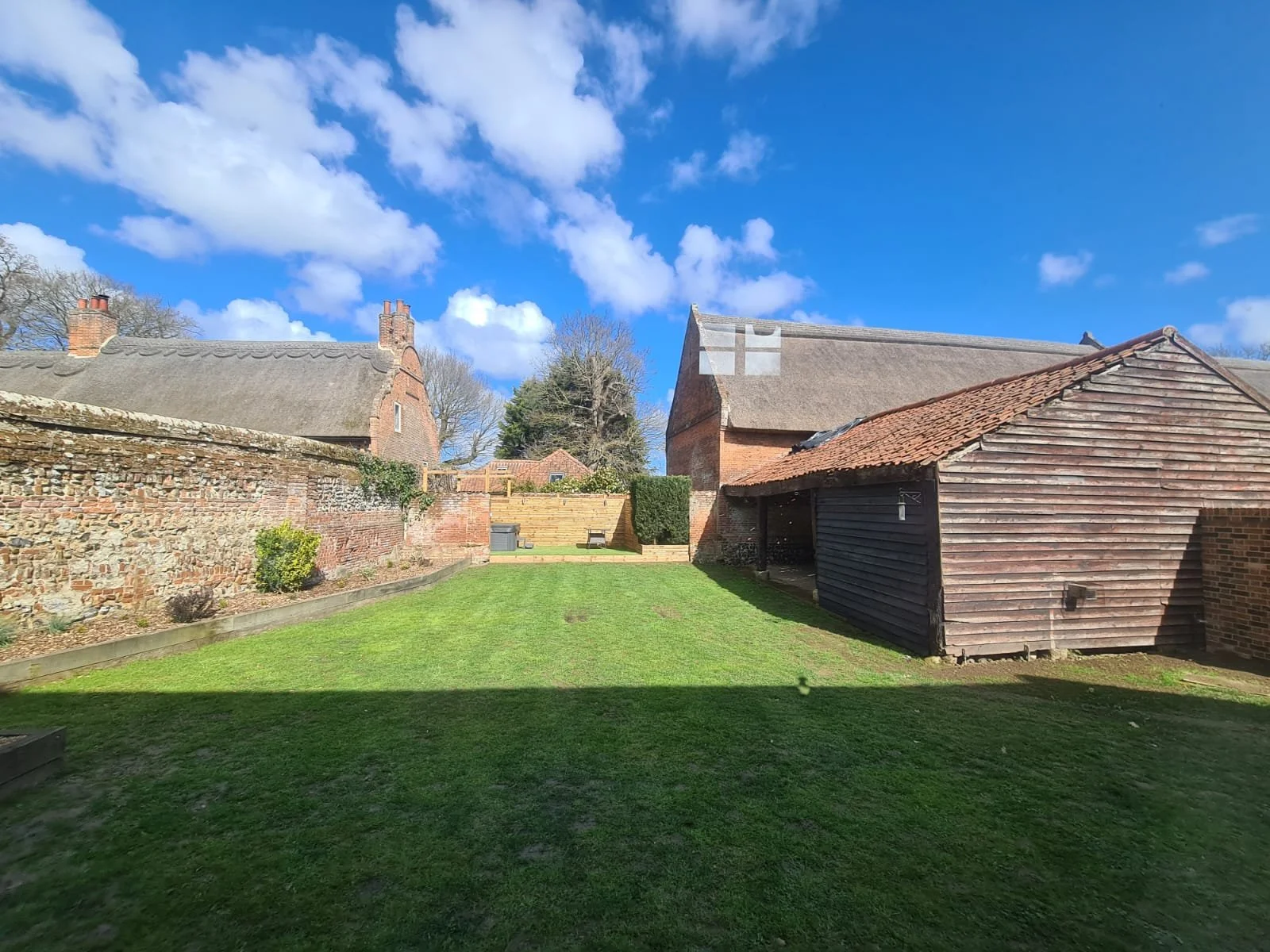 Colts Barn enclosed rear garden with hot tub