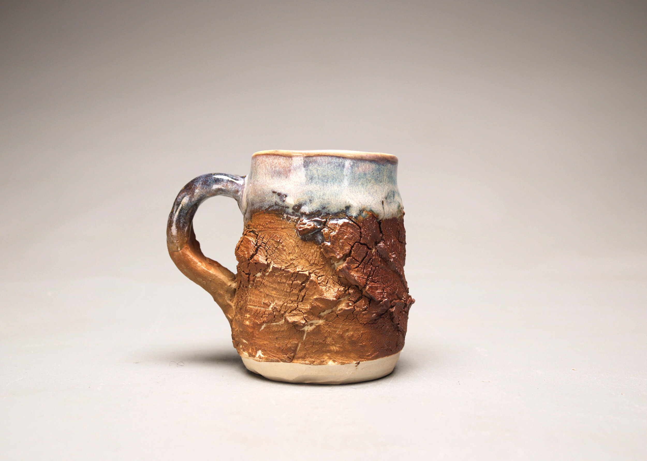 "Lakeside";
Grey Porcelain, Red Stoneware, Rutile Glaze;
4.75" x 4" x 2.75";
2019