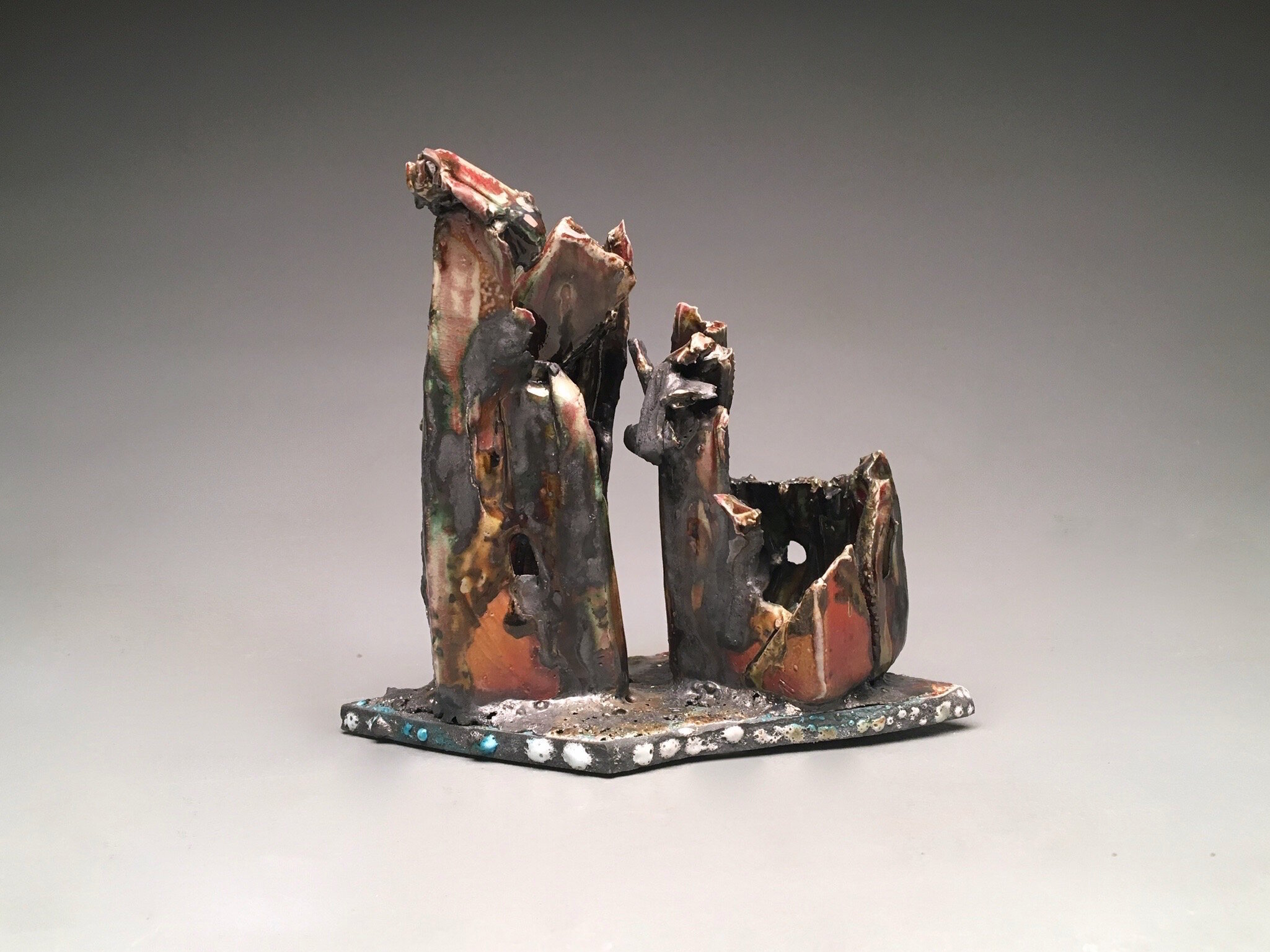 "What Remains";
Stoneware, Copper Wire, Copper Carbonate, Silicon Carbide Shelf, Soda Fire;
6.5" x 8" x 5";
2018