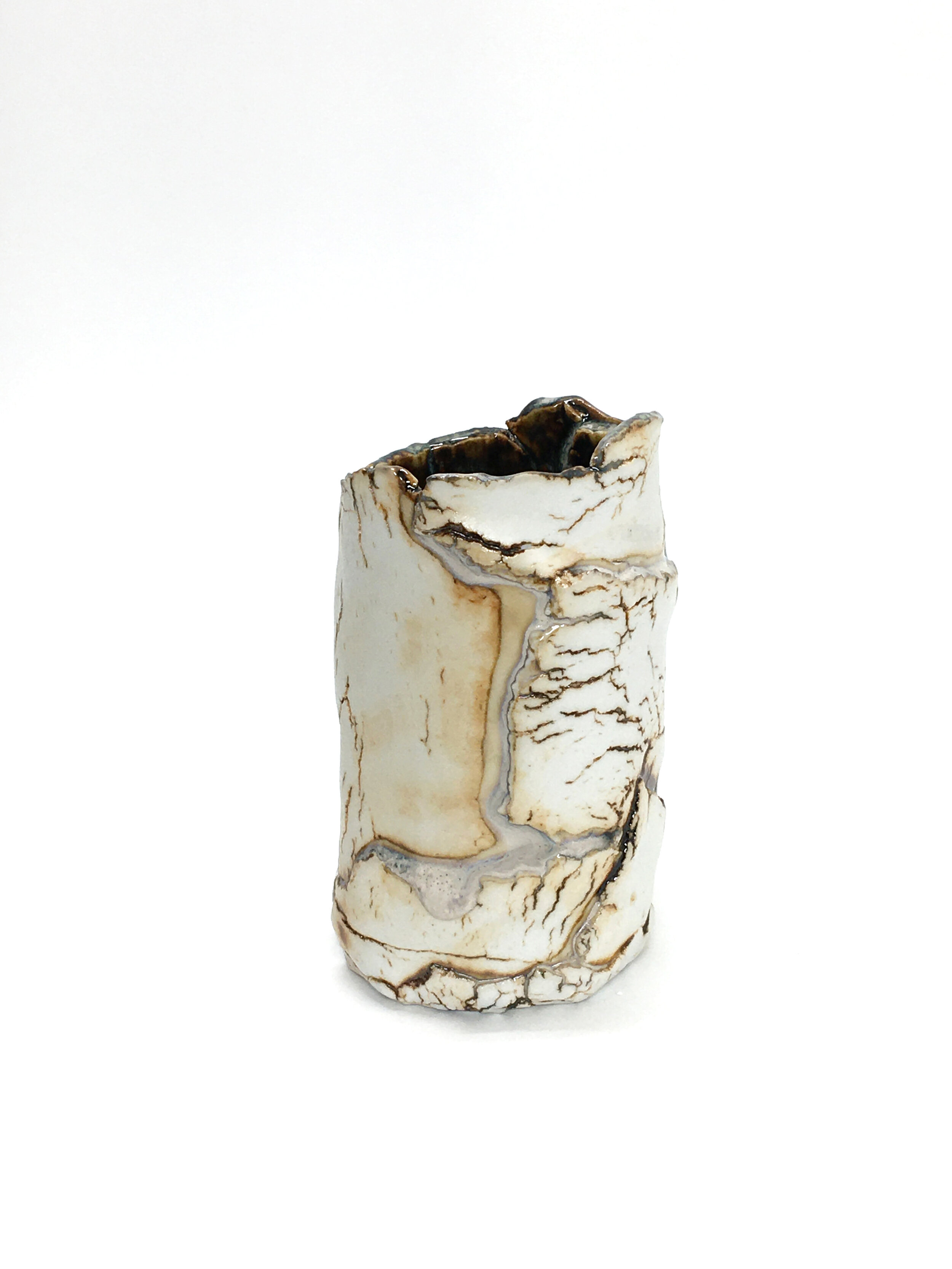 "Rivers Run Beneath Our Feet";
Porcelain, Temmokku, Rutile, Iron;
3" x 3" X 5";
2020