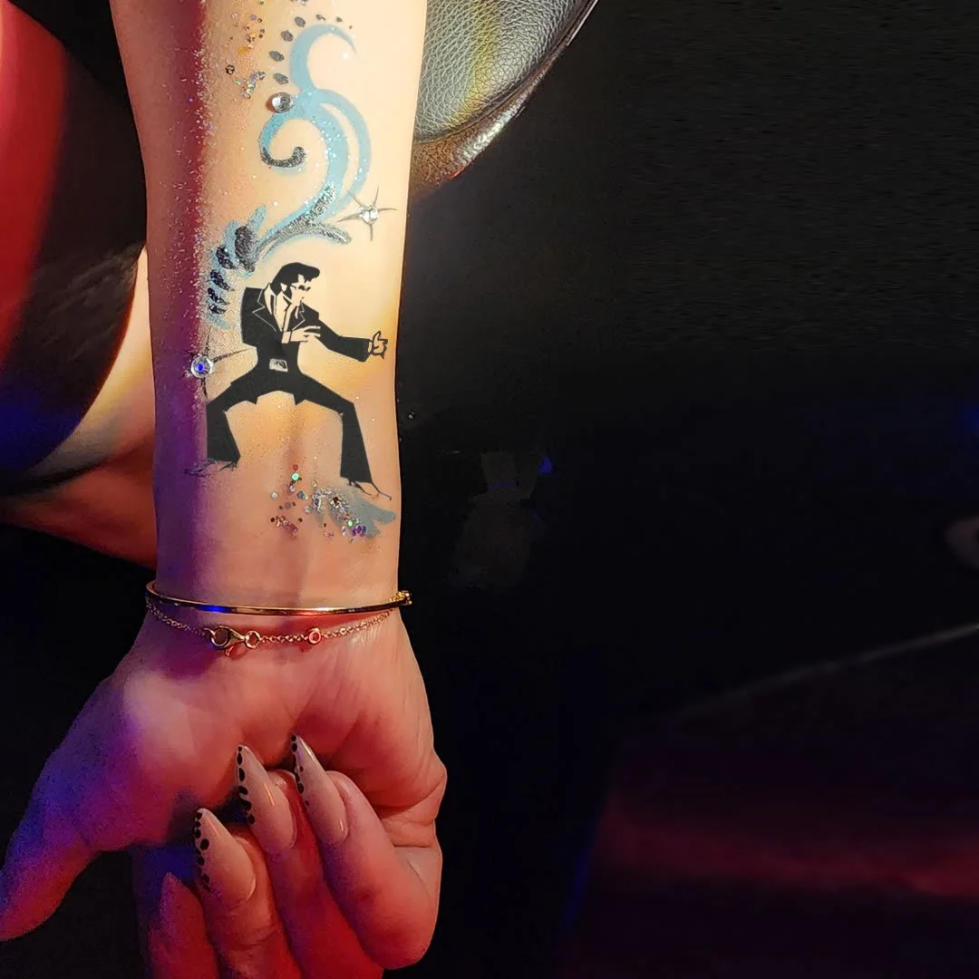 agent-elvis-arm-tattoo.jpg