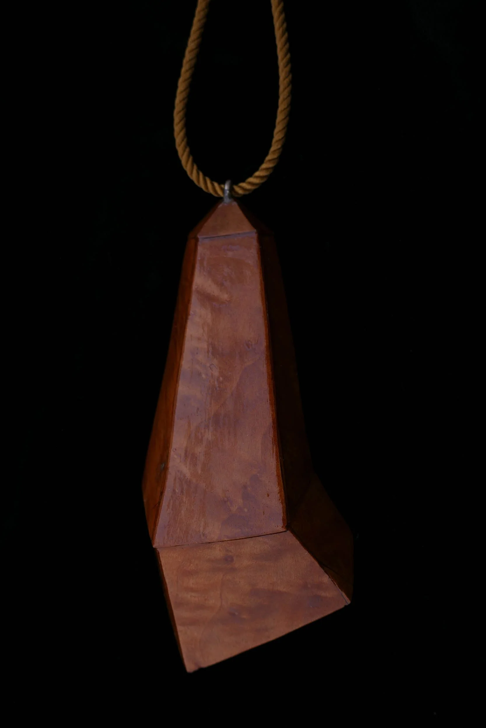 Travelling case for a ghost. Sterling silver, mahogany veneer, cord, 2022