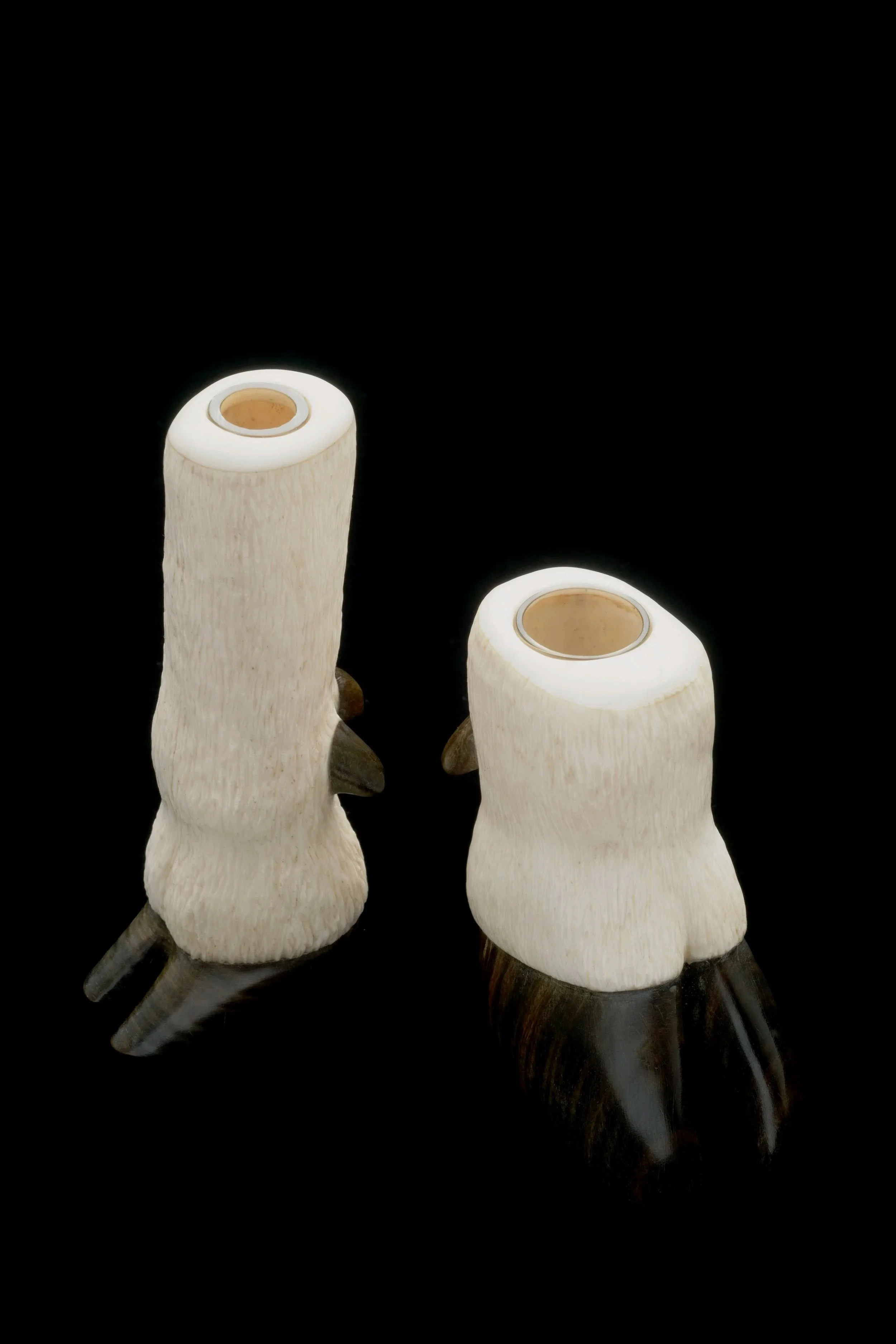 Ungulates.  Cow bone, lignum vitae, glass. 2020