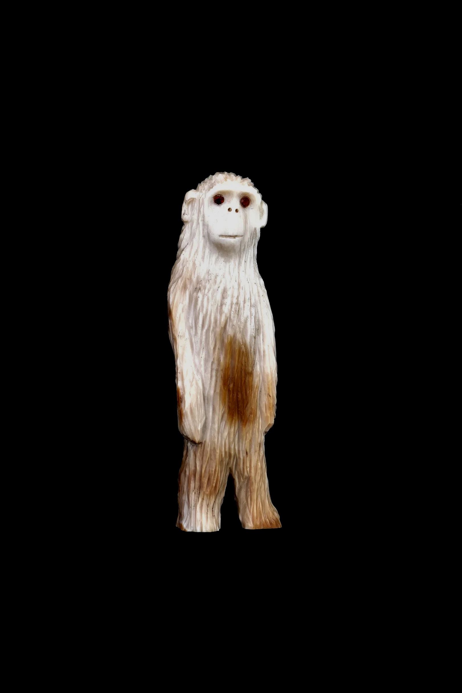 Tiny Tim. Mastodon tusk, sterling silver, garnet. 2023