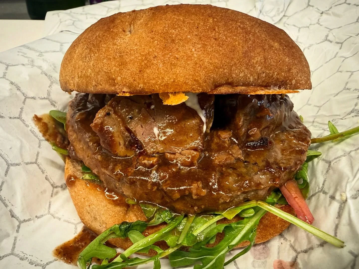 This week&rsquo;s variant is The Braised Burger! 
Everything you already love about the Braisedwich with the addition of a Salisbury Style hamburger patty (stewed in brown gravy)!

And your eyes do not deceive you, we are bringing back our biscuits a