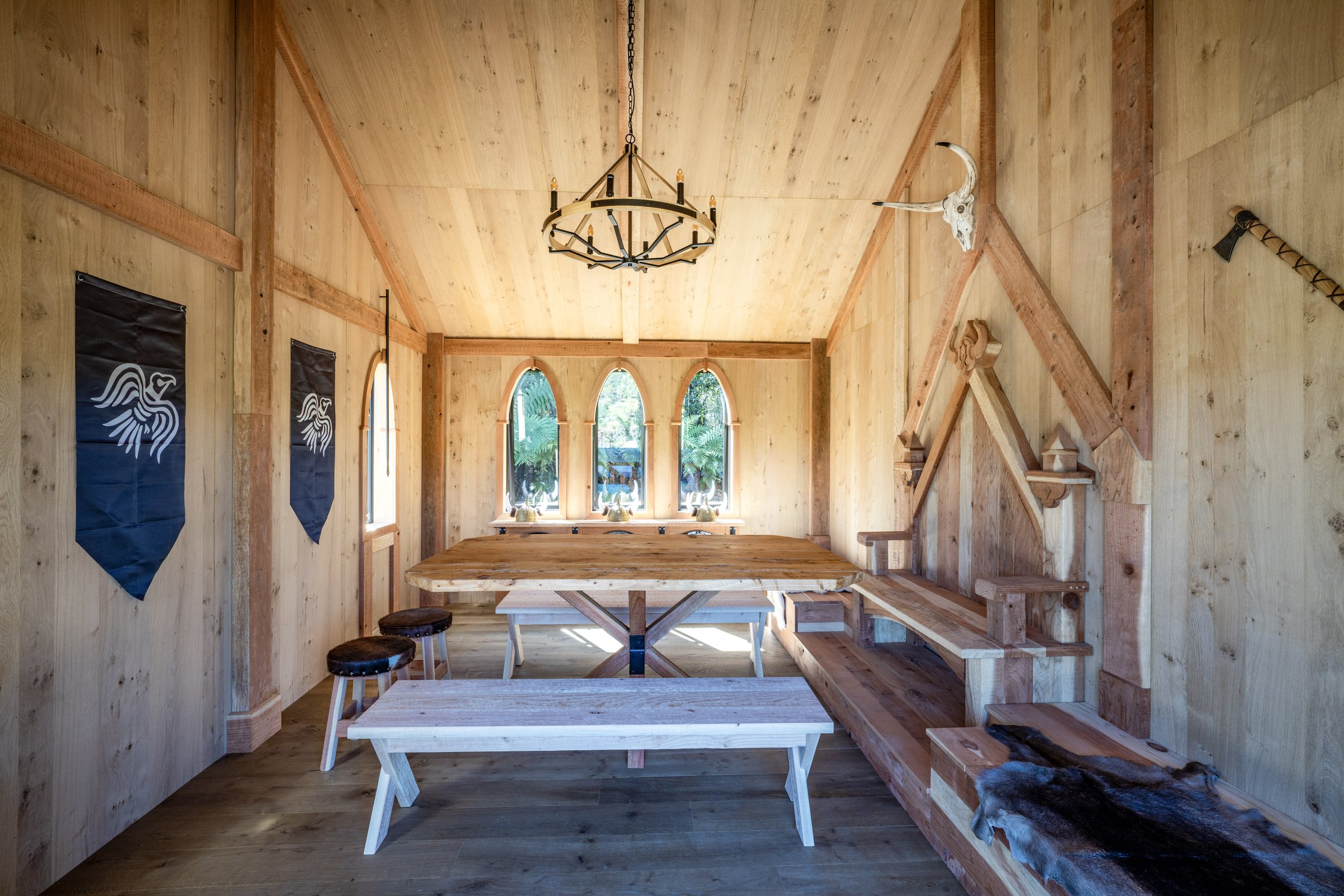 Viking Village, Great Hall design and fitout featuring a throne, dining table, window finishes, wall cladding and double doors