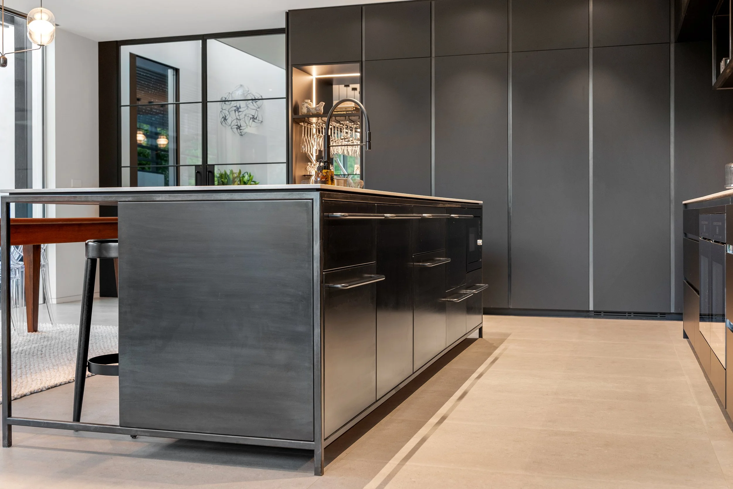 Black and steel kitchen. Part of a full multi level home fitout
