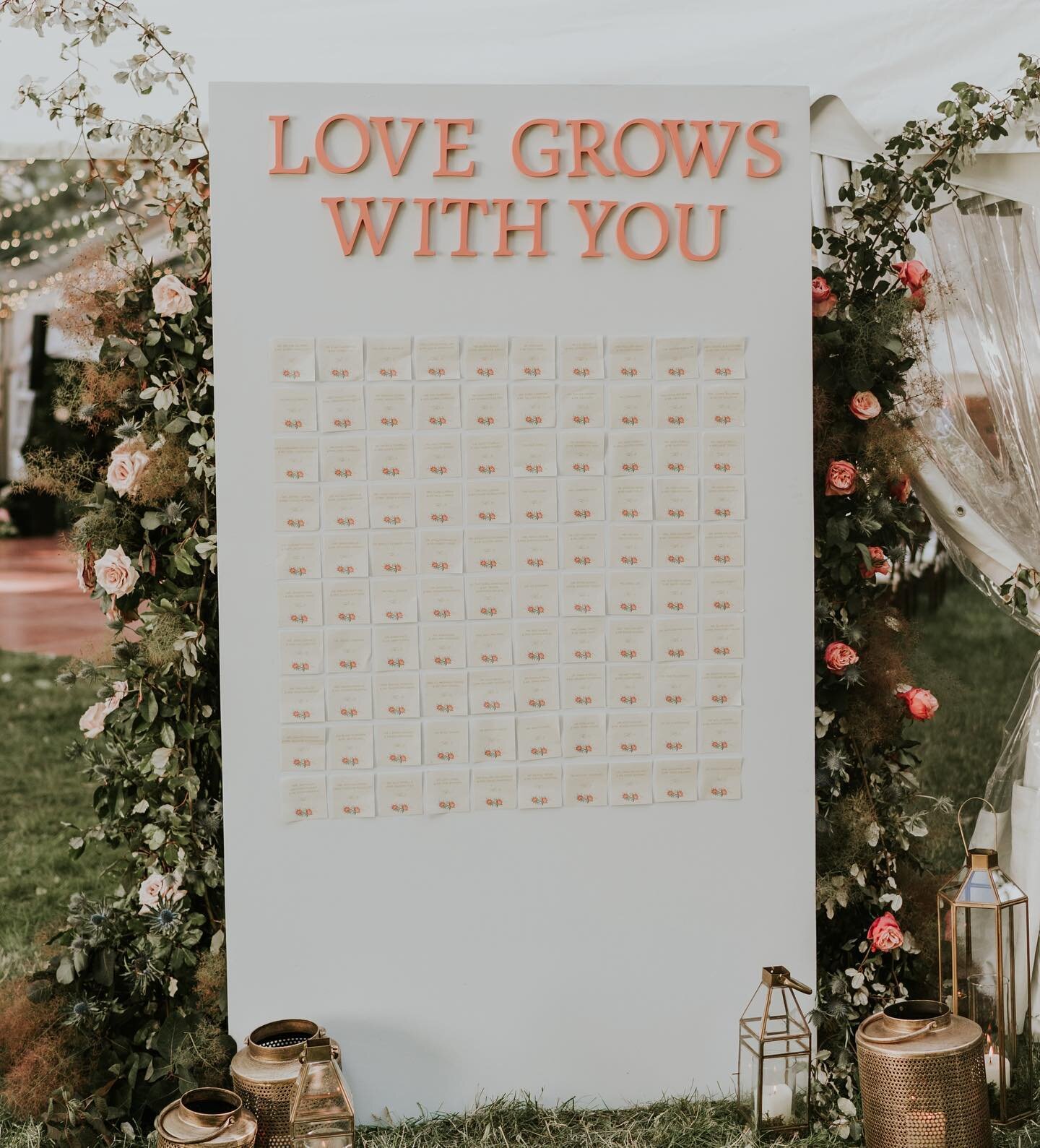 Escort display with seed paper escort cards. Guests were able to plant their escort cards and grow wildflowers. Perfect for this garden wedding!

And guess what was on the other side of this wall?! The headphones for the silent disco after party!

Ph