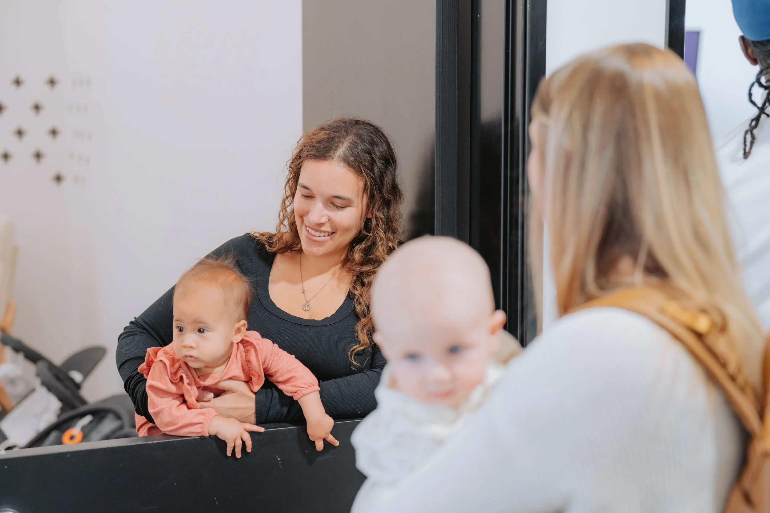 an image of kids with their mothers