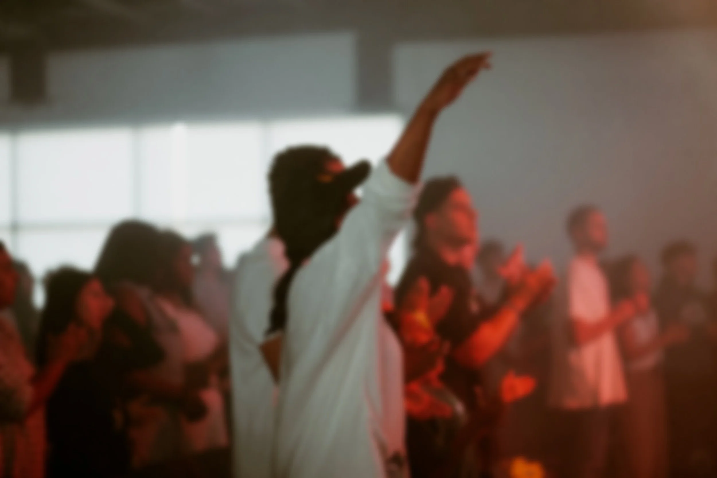 Christian young adults worshipping Jesus