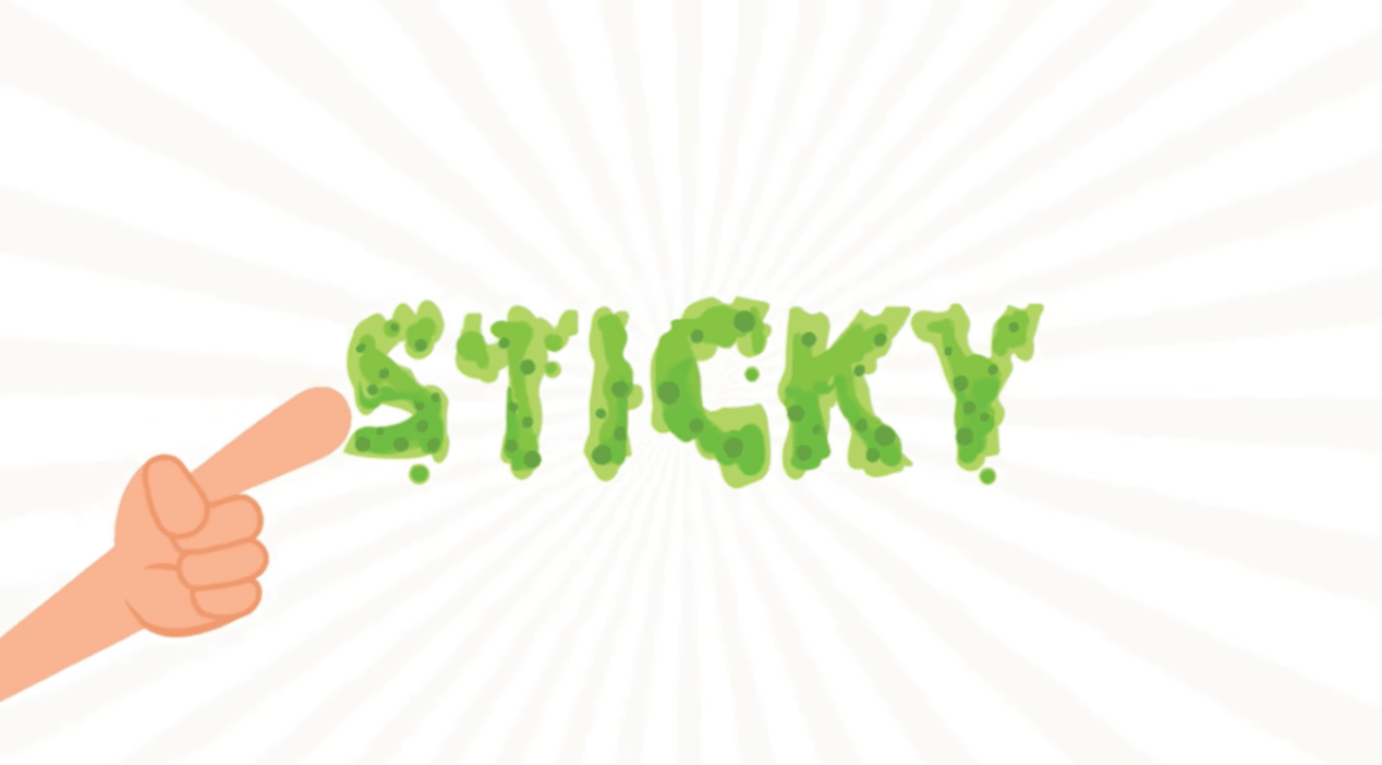 Green sticky typography spelling “Sticky” beside pointing hand