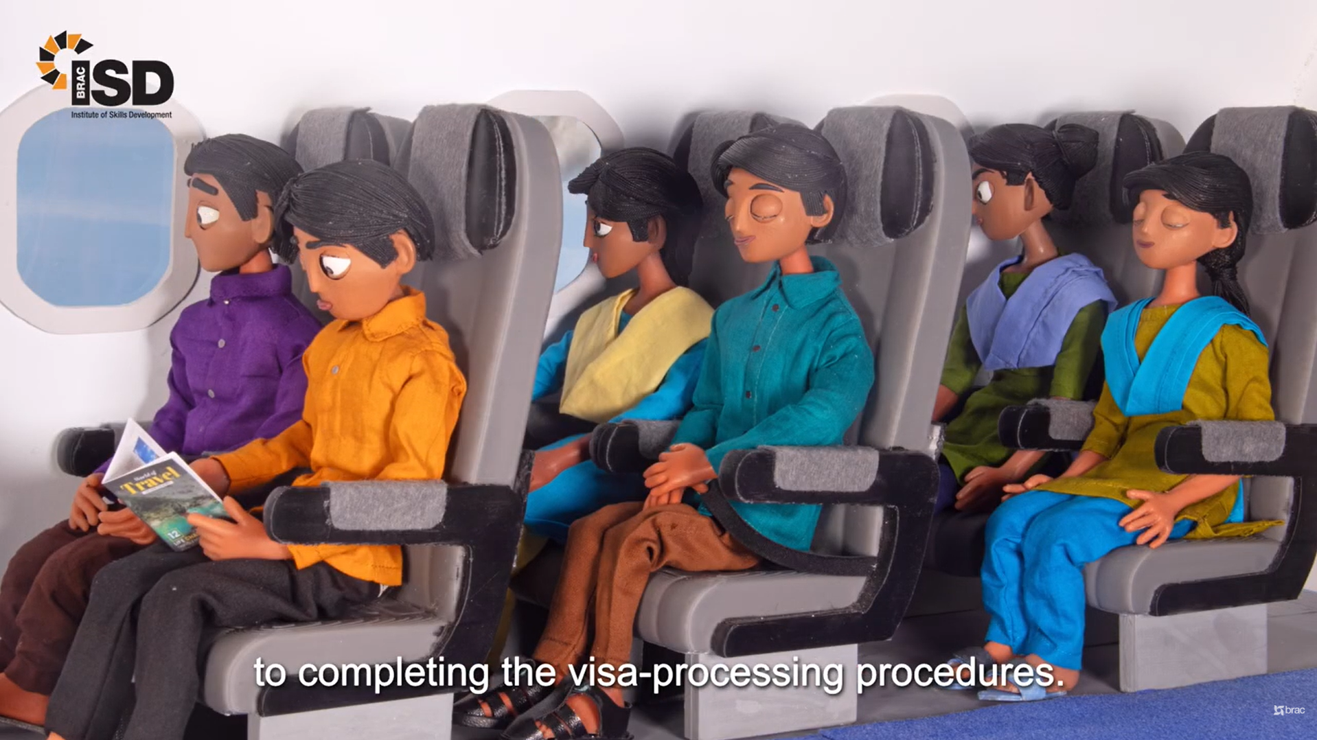 BRAC ISD stop-motion characters sit inside an airplane cabin while travelling together toward Japan.