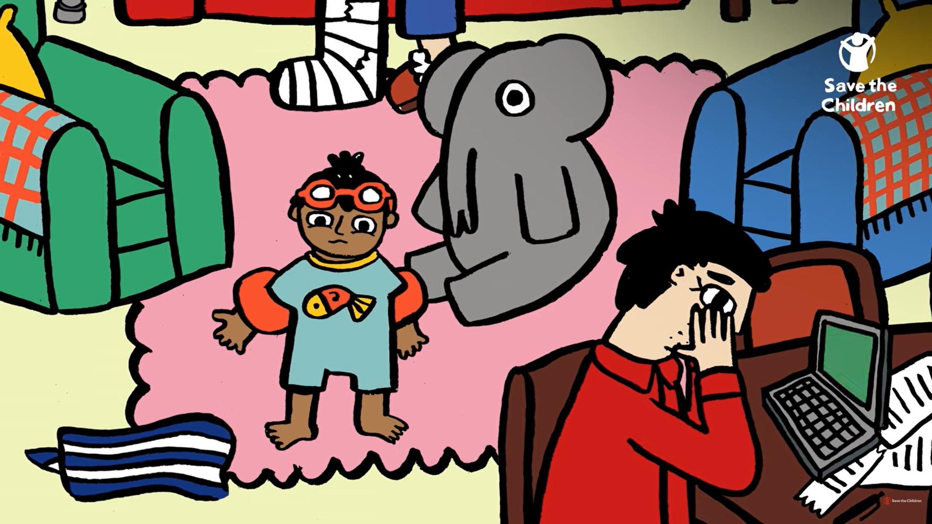 Child wearing swimming armbands stands beside an elephant while an adult works at a laptop.